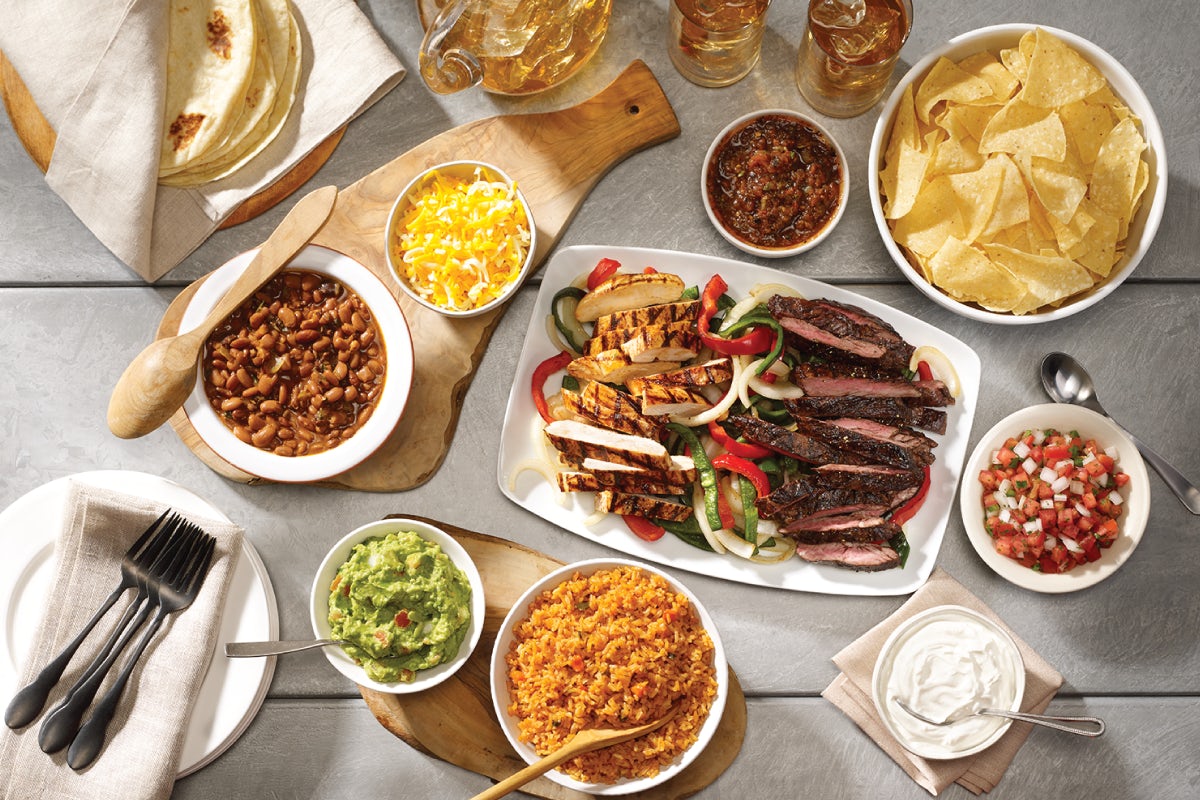 Order Family Fajita Meal for 4 food online from Uncle Julios Fine Mexican Foods store, Dallas on bringmethat.com