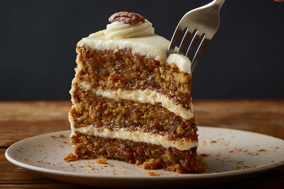 Order Triple-Layer Carrot Cake** food online from Outback Steakhouse store, Stockbridge on bringmethat.com