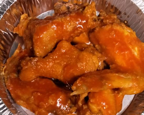 Order Buffalo wings (6pcs) food online from AGAPE KITCHEN & PRALINES store, Humble on bringmethat.com