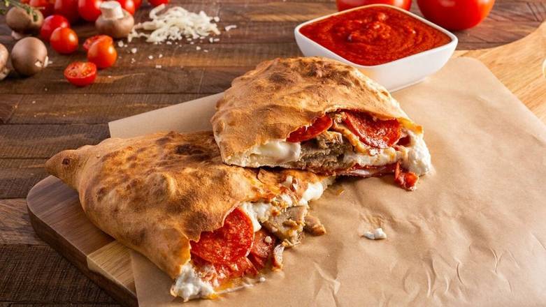 Order Meat Lovers Calzone food online from Ameci Pizza & Pasta store, Los Alamitos on bringmethat.com