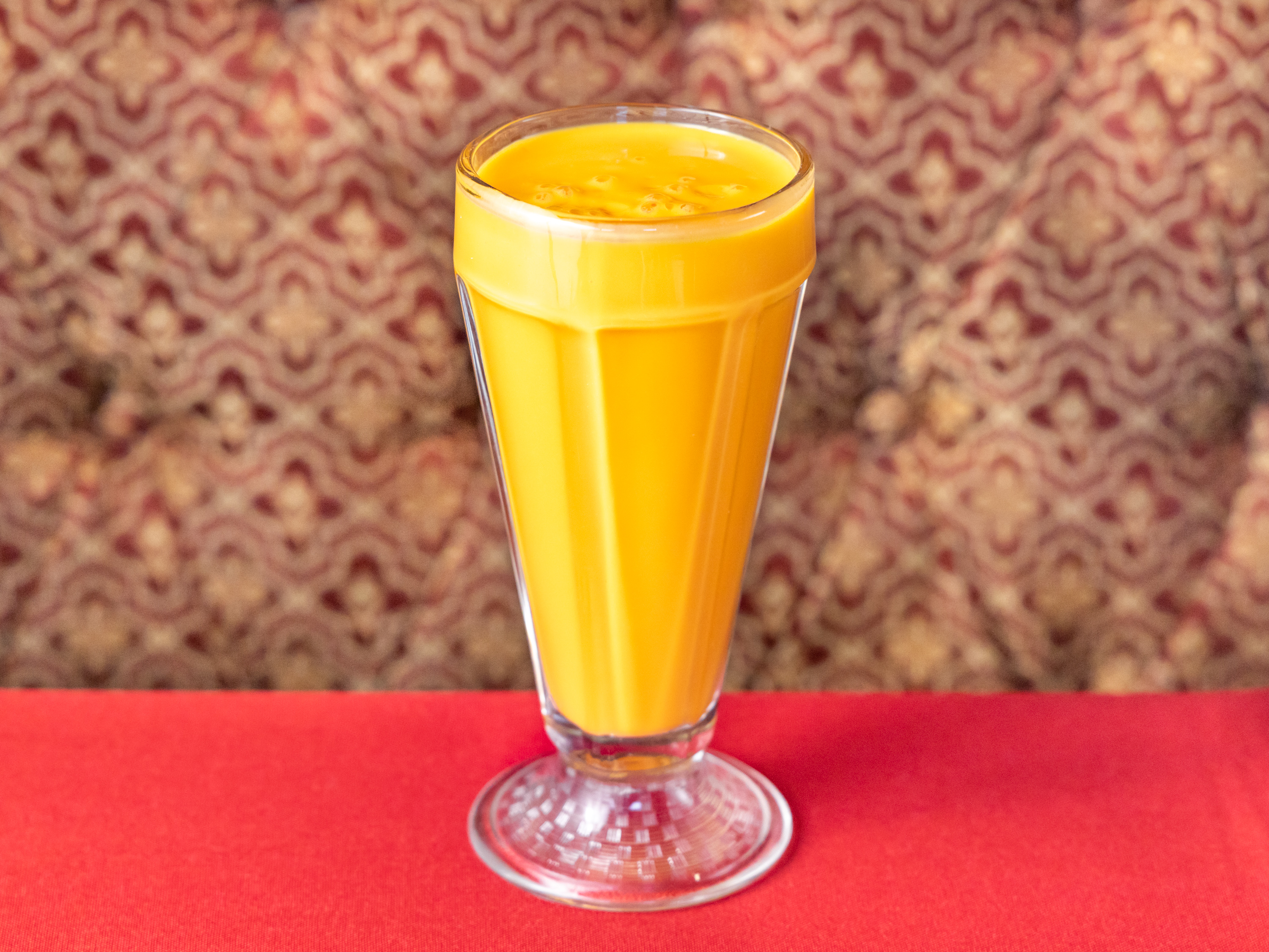 Order Mango Lassi food online from Lal Mirch Indian Restaurant store, Agoura Hills on bringmethat.com