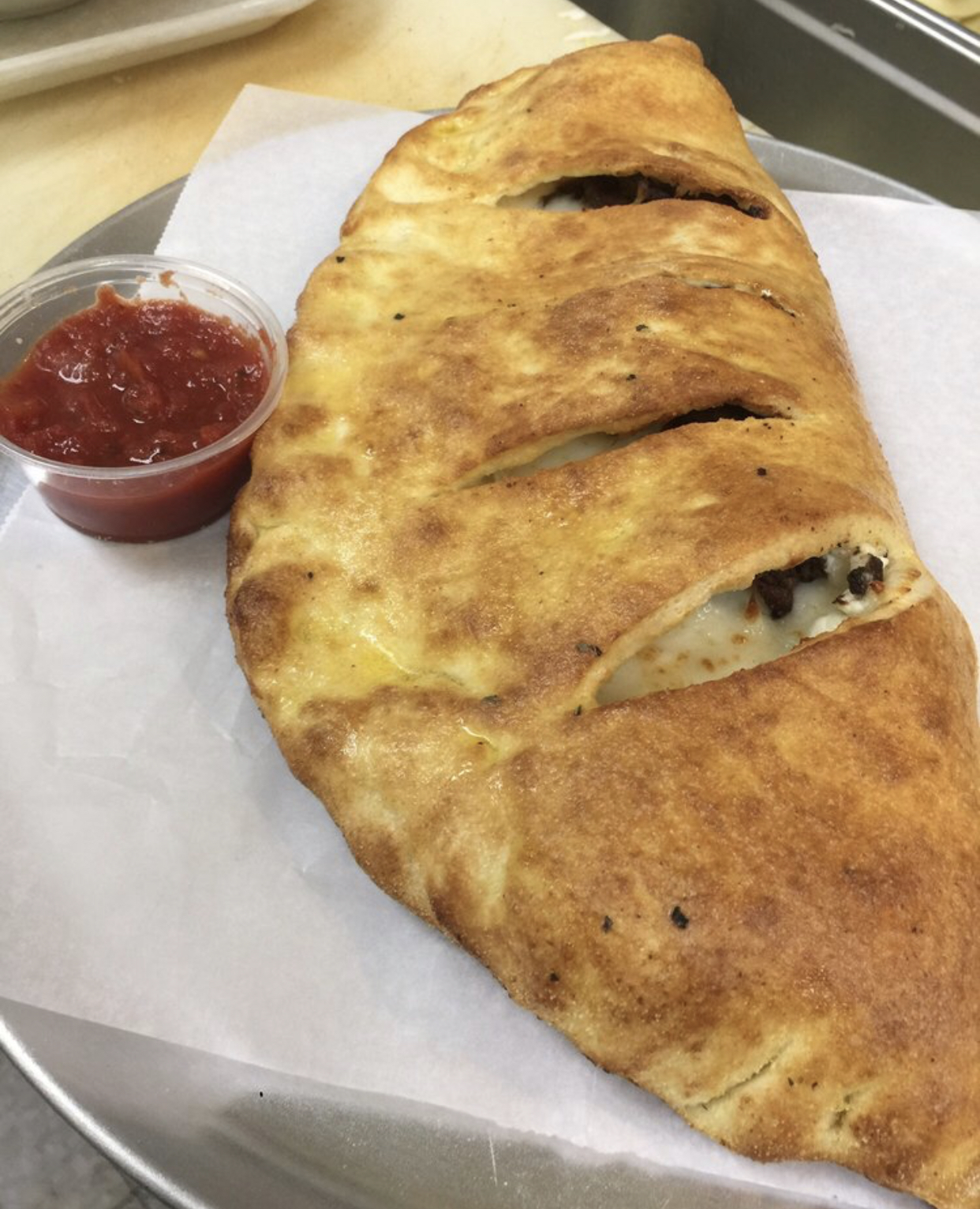 Order 2 Reg. Stromboli with ham and pepperoni food online from Vino's Pizzeria store, Greensboro on bringmethat.com
