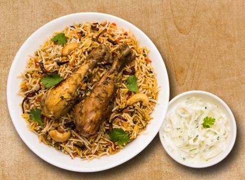Order Chicken Biryani Theory food online from Curry Consortium store, Topeka on bringmethat.com