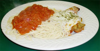 Order Veal Parmigiana with Spaghetti - Pasta food online from Primas Pasta & Pizza Restaurant store, Fort Worth on bringmethat.com