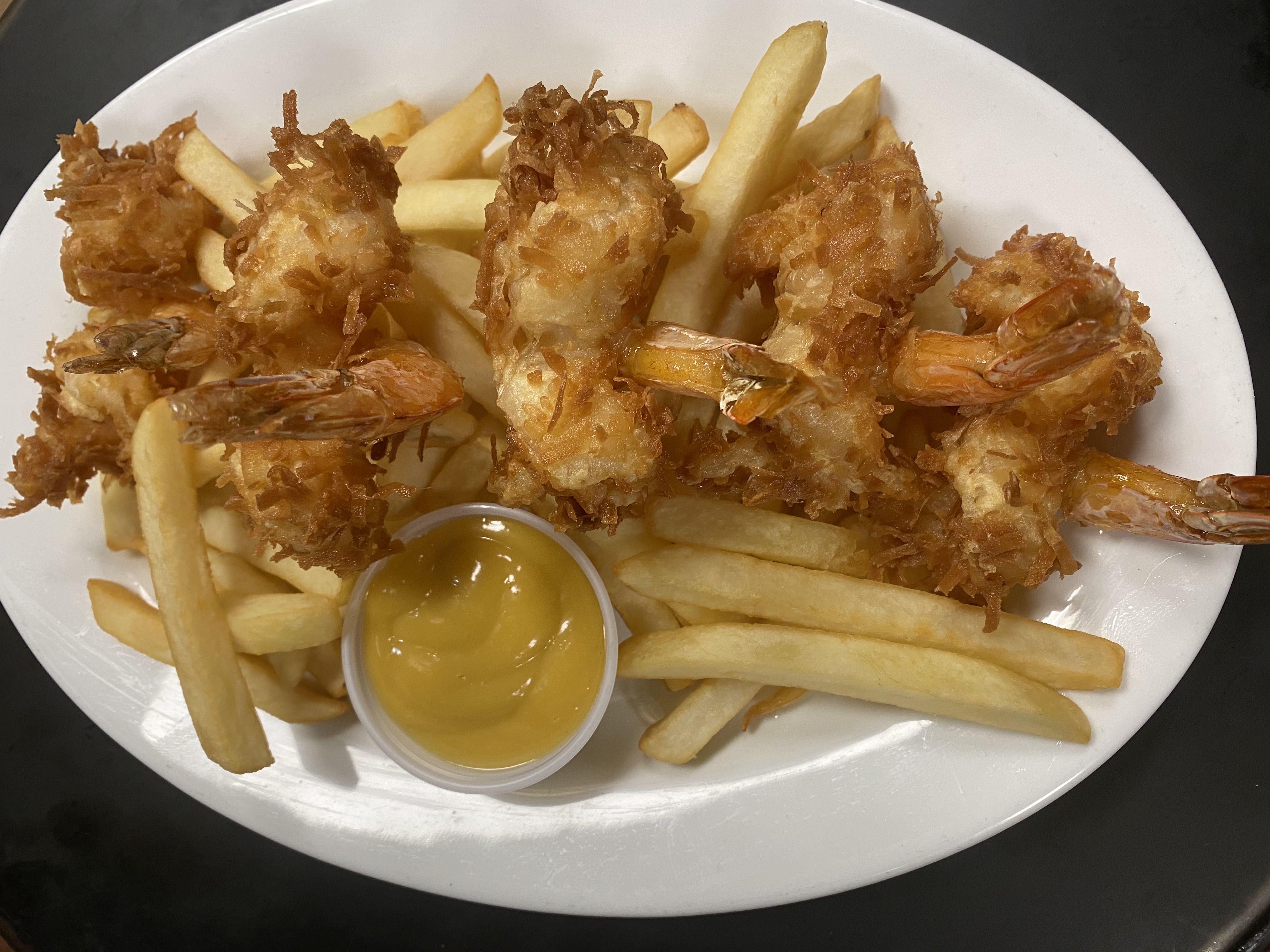 Order Jumbo Coconut Shrimp food online from Famous Calabria store, New York on bringmethat.com