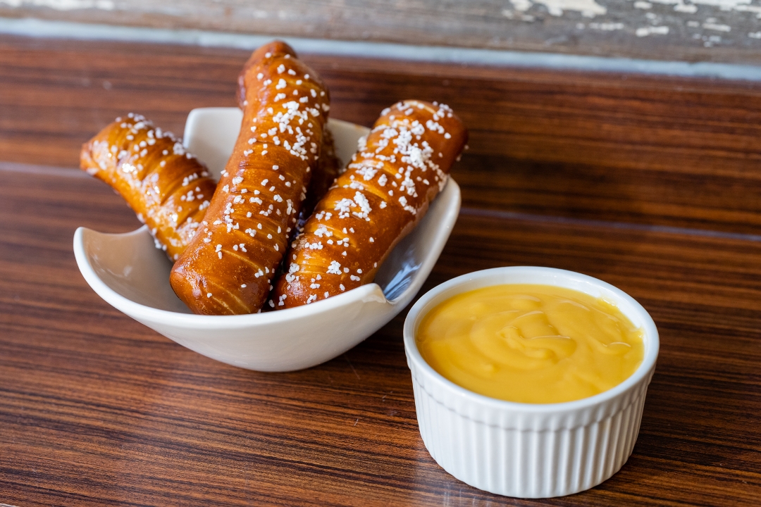 Order Pretzel with Cheese Sauce food online from The Dam store, Saint Louis on bringmethat.com