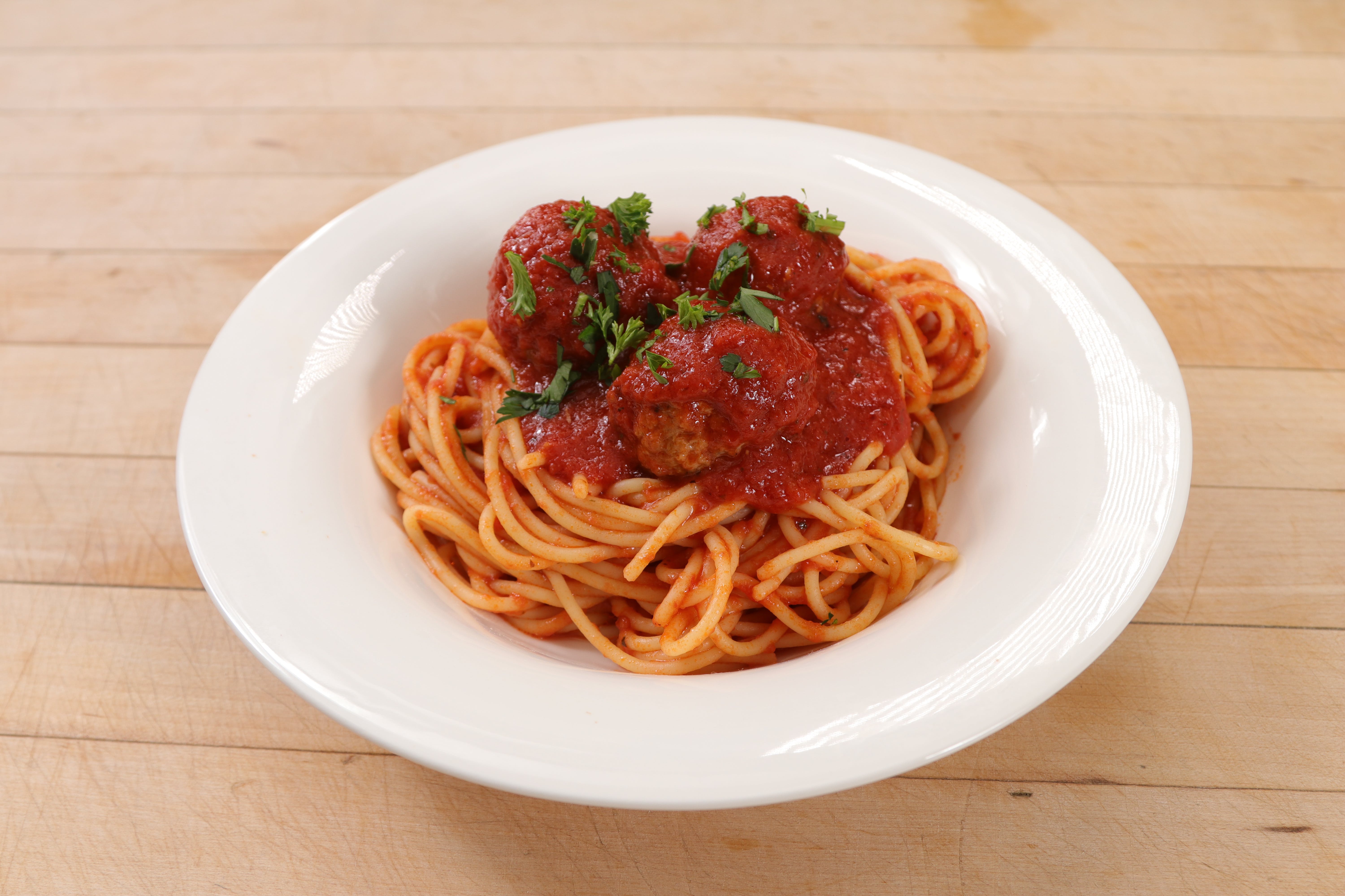Order Spaghetti with Meatballs - Regular food online from Ameci Pizza & Pasta store, Camarillo on bringmethat.com