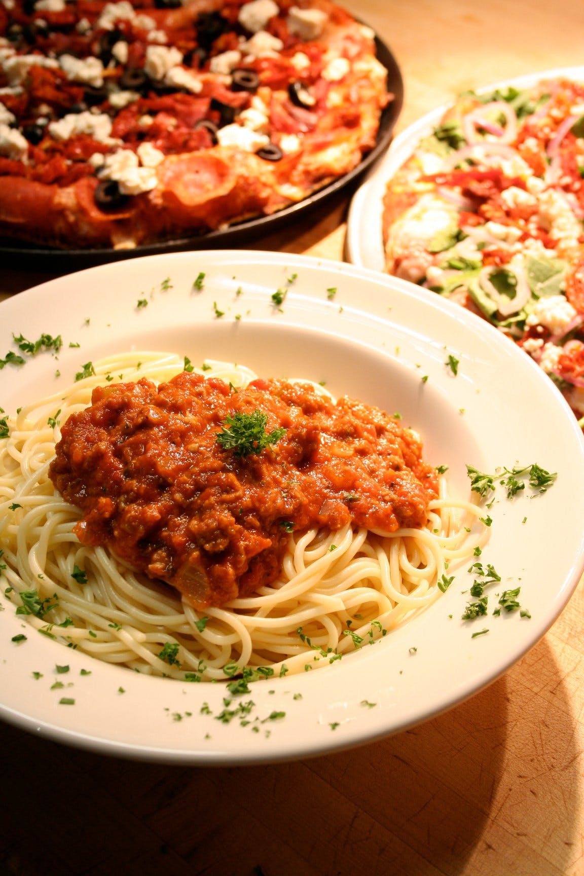 Order Pasta with Housemade Meat Sauce - Pasta food online from Fultano's Pizza store, Cannon Beach on bringmethat.com