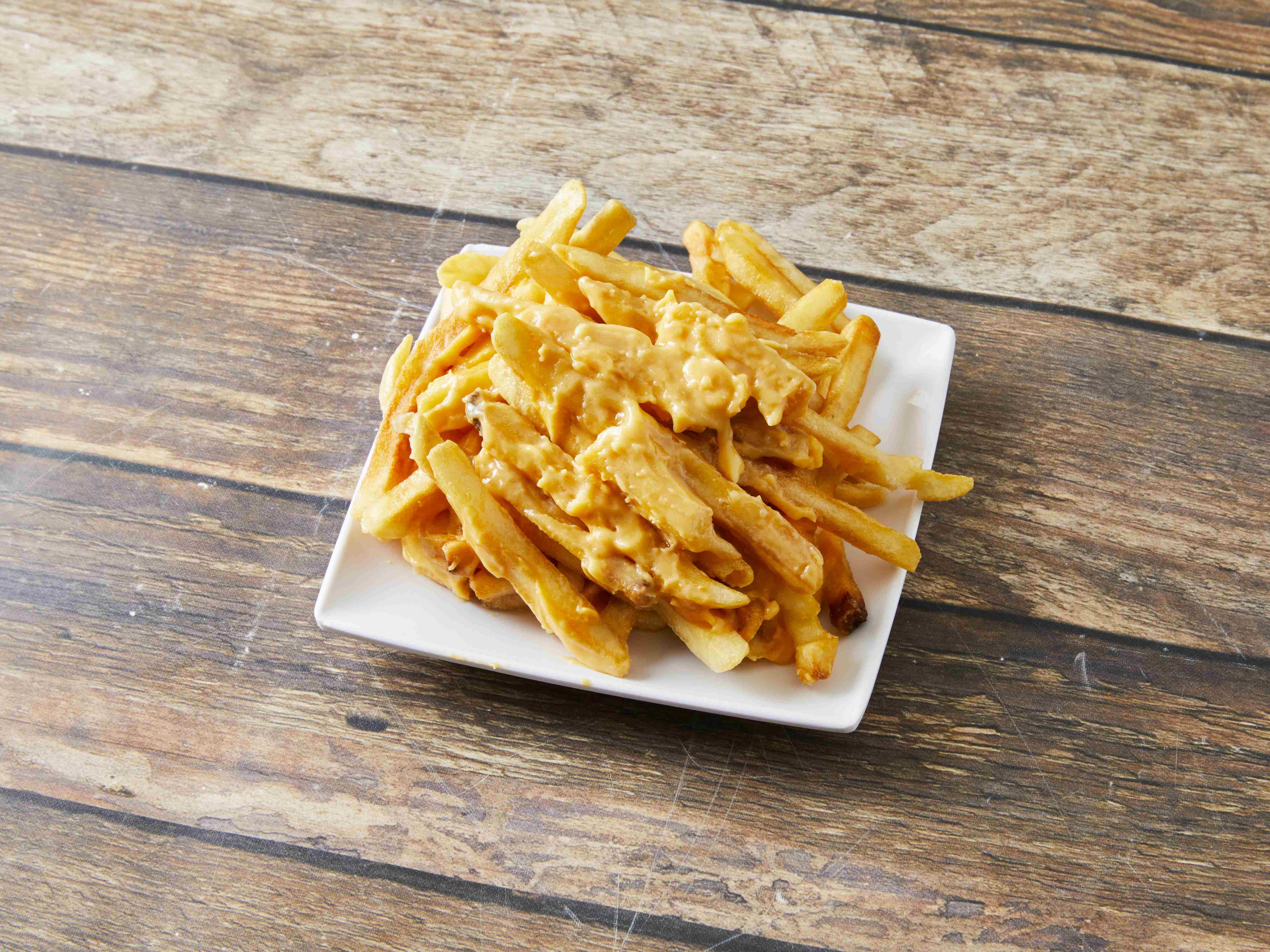 Order Cheese Fries food online from Mr. Zee's Famous Chicken store, Chicago on bringmethat.com