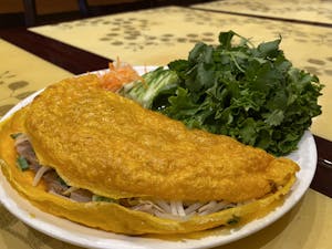 Order 15. Bánh Xèo - Rich Folks Golden Crepes food online from Present Restaurant store, Falls Church on bringmethat.com