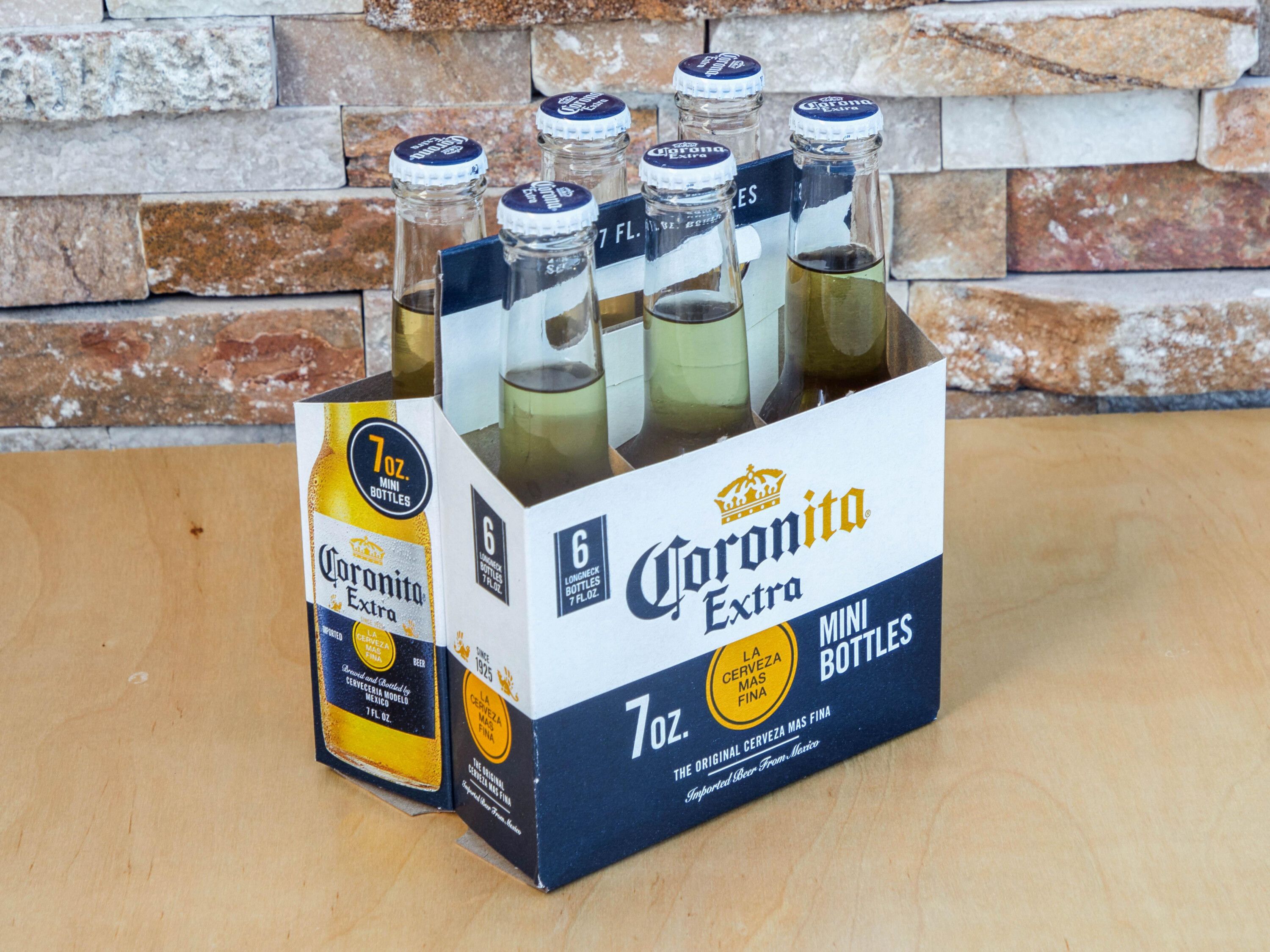 Order 6 Bottled Corona Extra  food online from Sk Food Mart store, Mesa on bringmethat.com