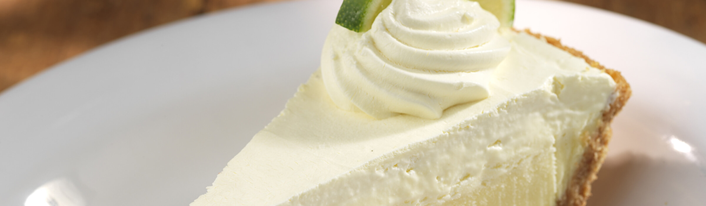 Order Key Lime Pie food online from Hooters store, Countryside on bringmethat.com
