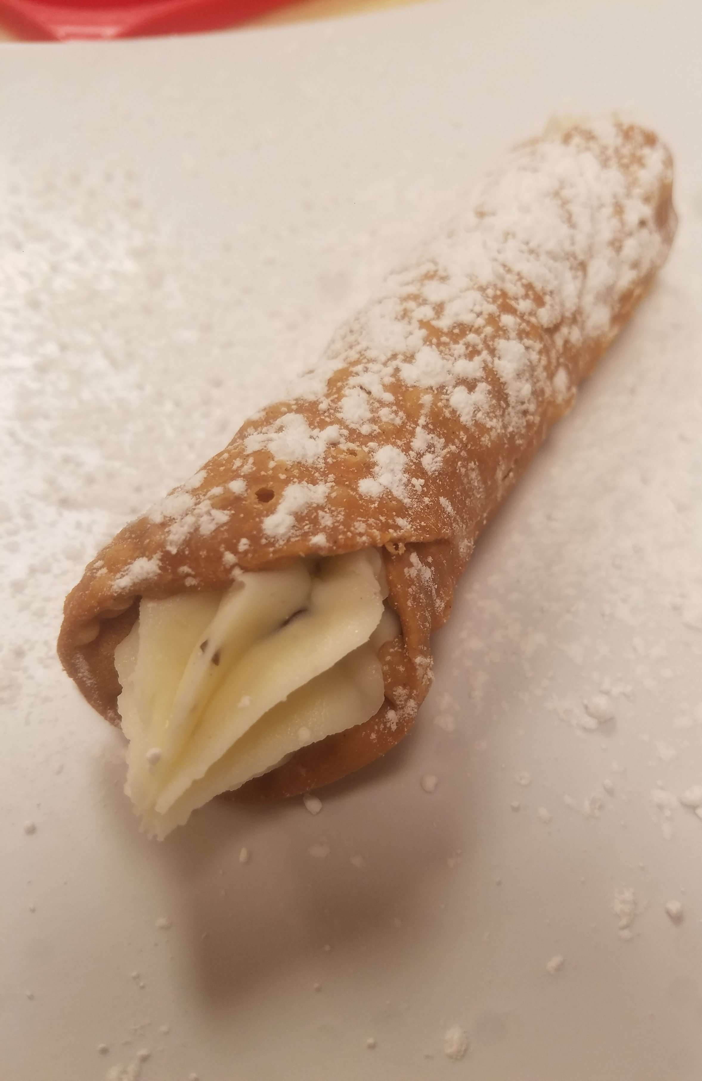 Order Cannoli Party Pan food online from Rocky's Pizza store, Huntersville on bringmethat.com