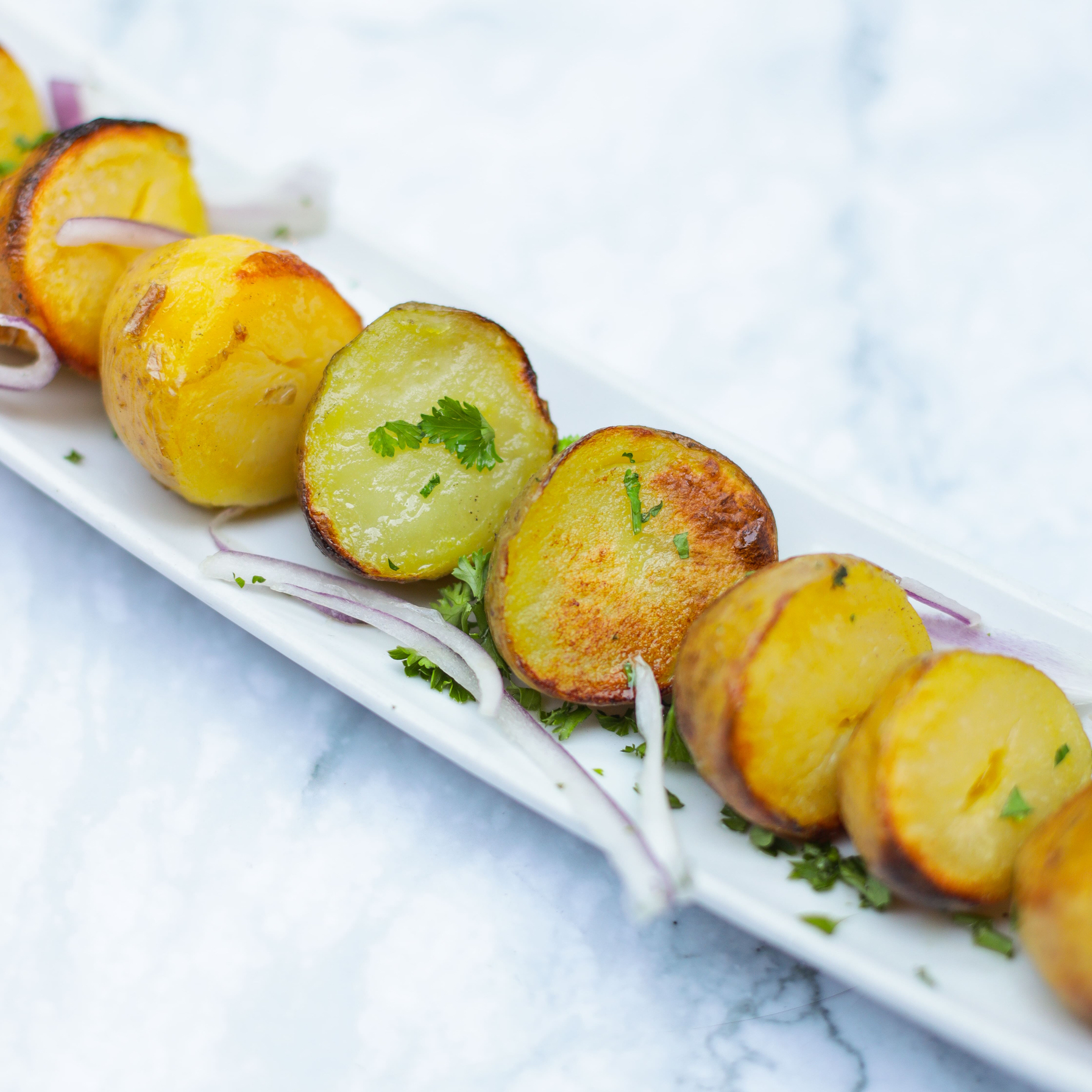 Order Grilled Potatoes food online from Olive And Grill store, Studio City on bringmethat.com
