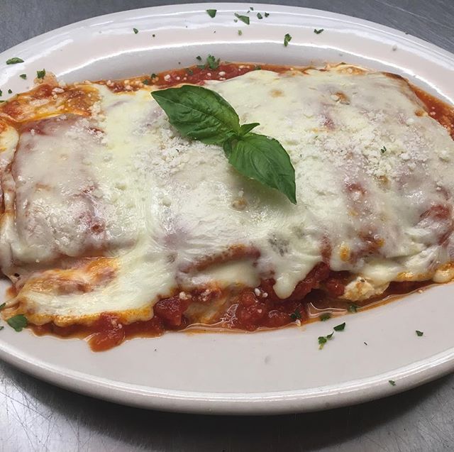 Order Chicken Parmigiana food online from Calabria Pizza store, Oradell on bringmethat.com