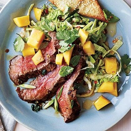 Order Grilled Asian Flank Steak with Mango Salad Entree food online from The Spice Of Life Catering store, Carrollton on bringmethat.com