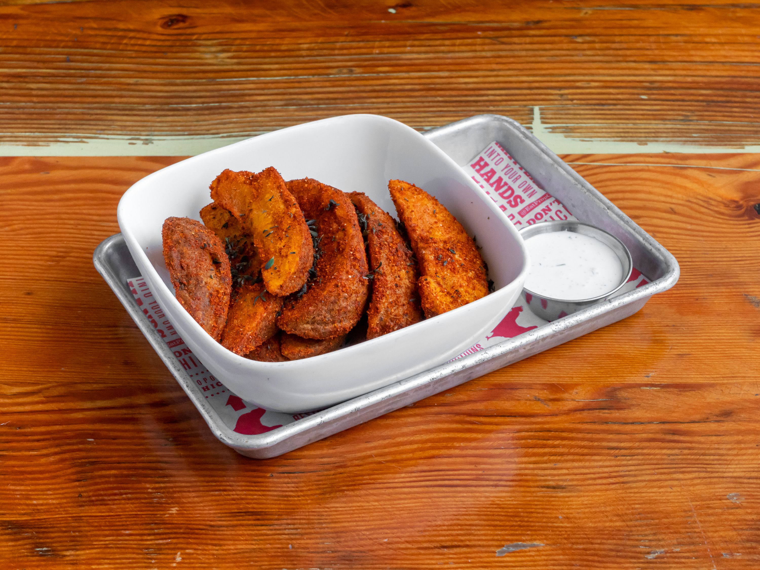 Order Garlic ＆ Thyme Potato Wedges food online from Proposition Chicken store, San Francisco on bringmethat.com