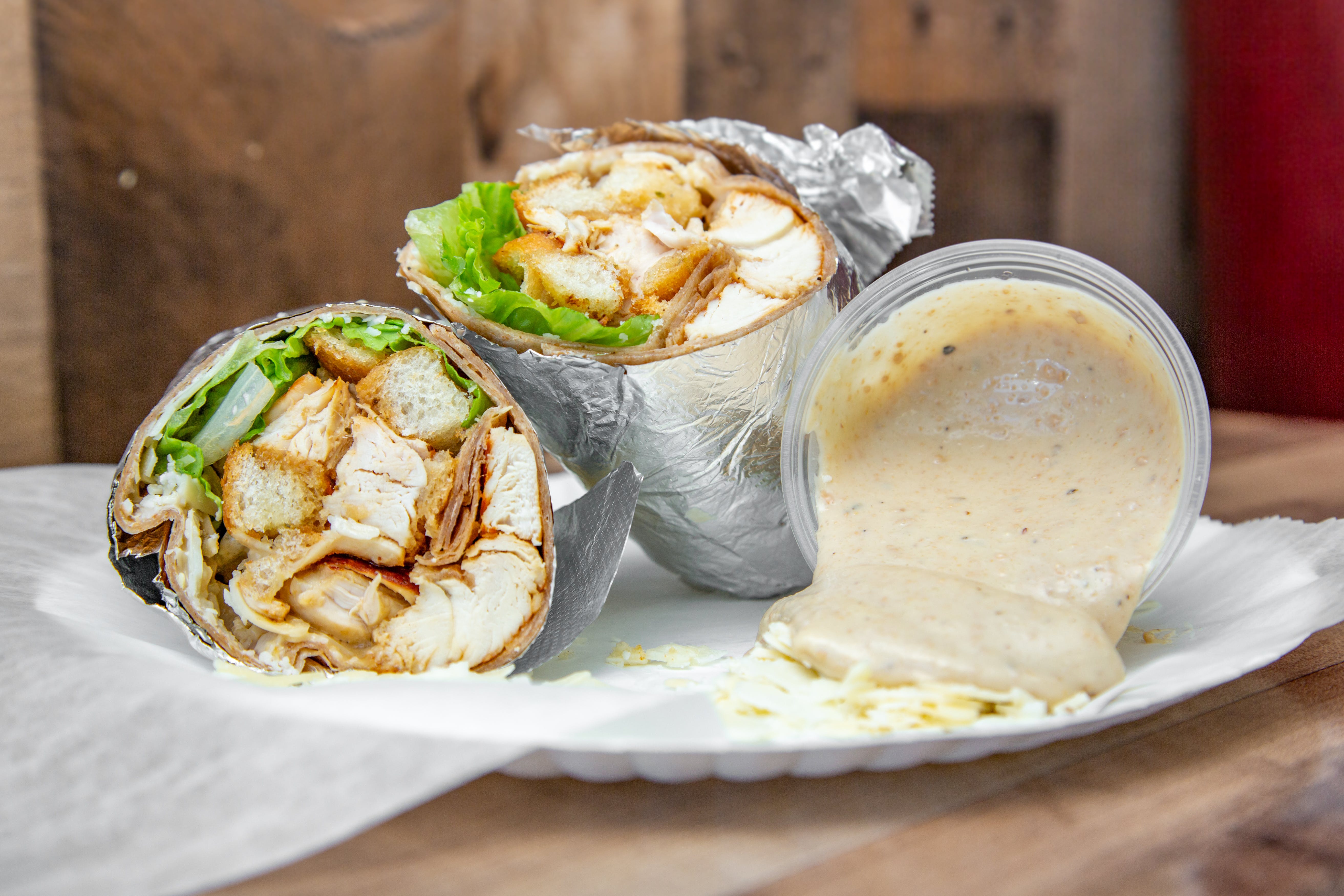Order Chicken Caesar Wrap - Wrap food online from Mama Ginas store, Somerville on bringmethat.com
