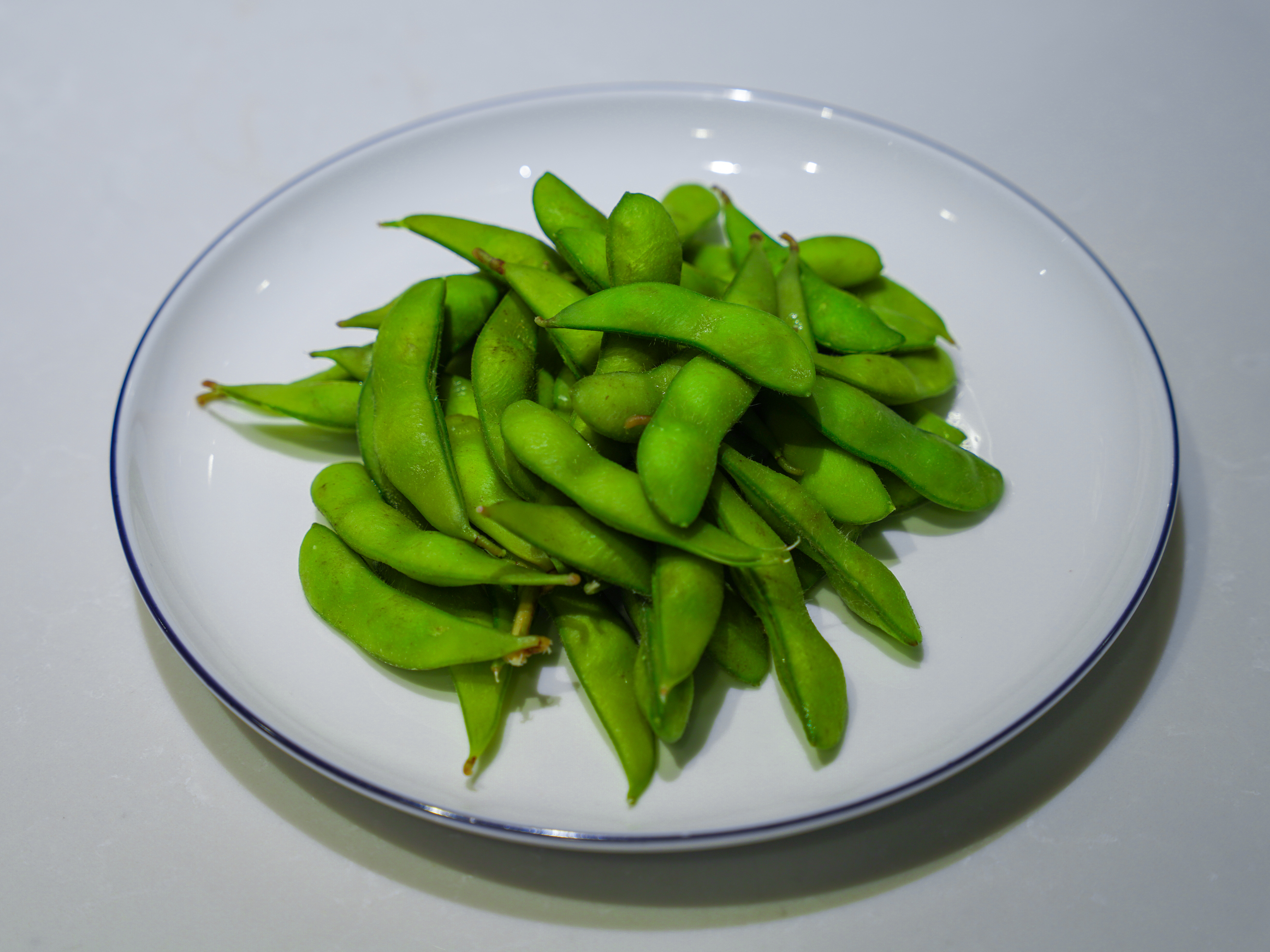 Order Edamame food online from Dumpling and Noodle store, New York on bringmethat.com