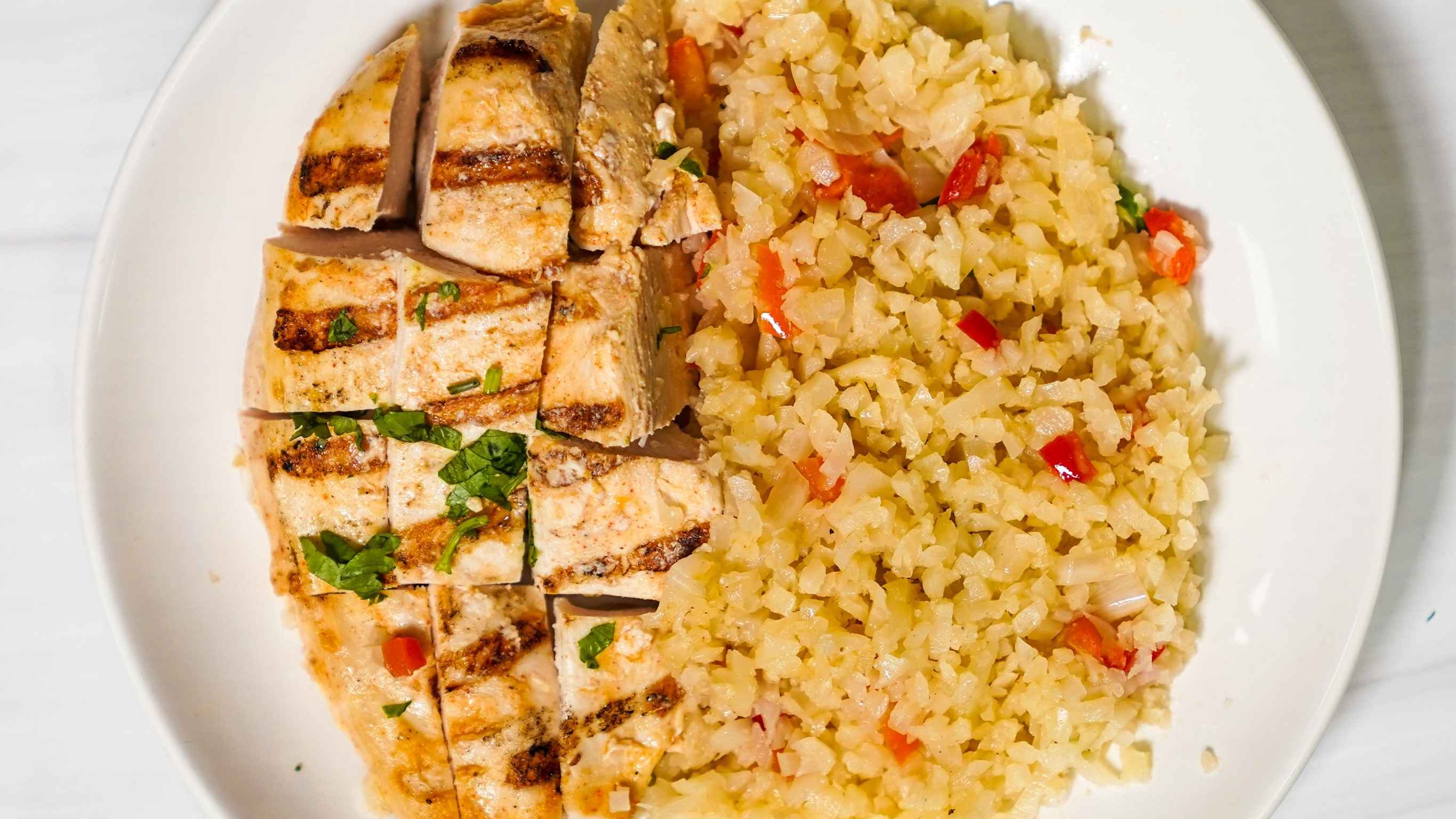 Order Grilled Chicken & Cauli Rice  food online from Fork to Fit Kitchen store, Mcallen on bringmethat.com