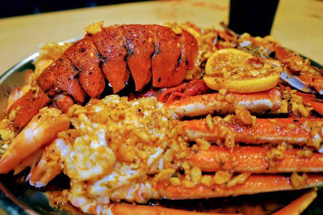 Order Lobster Tail ( 2 pcs ) food online from Red Pier Cajun Seafood & Bar store, Southaven on bringmethat.com