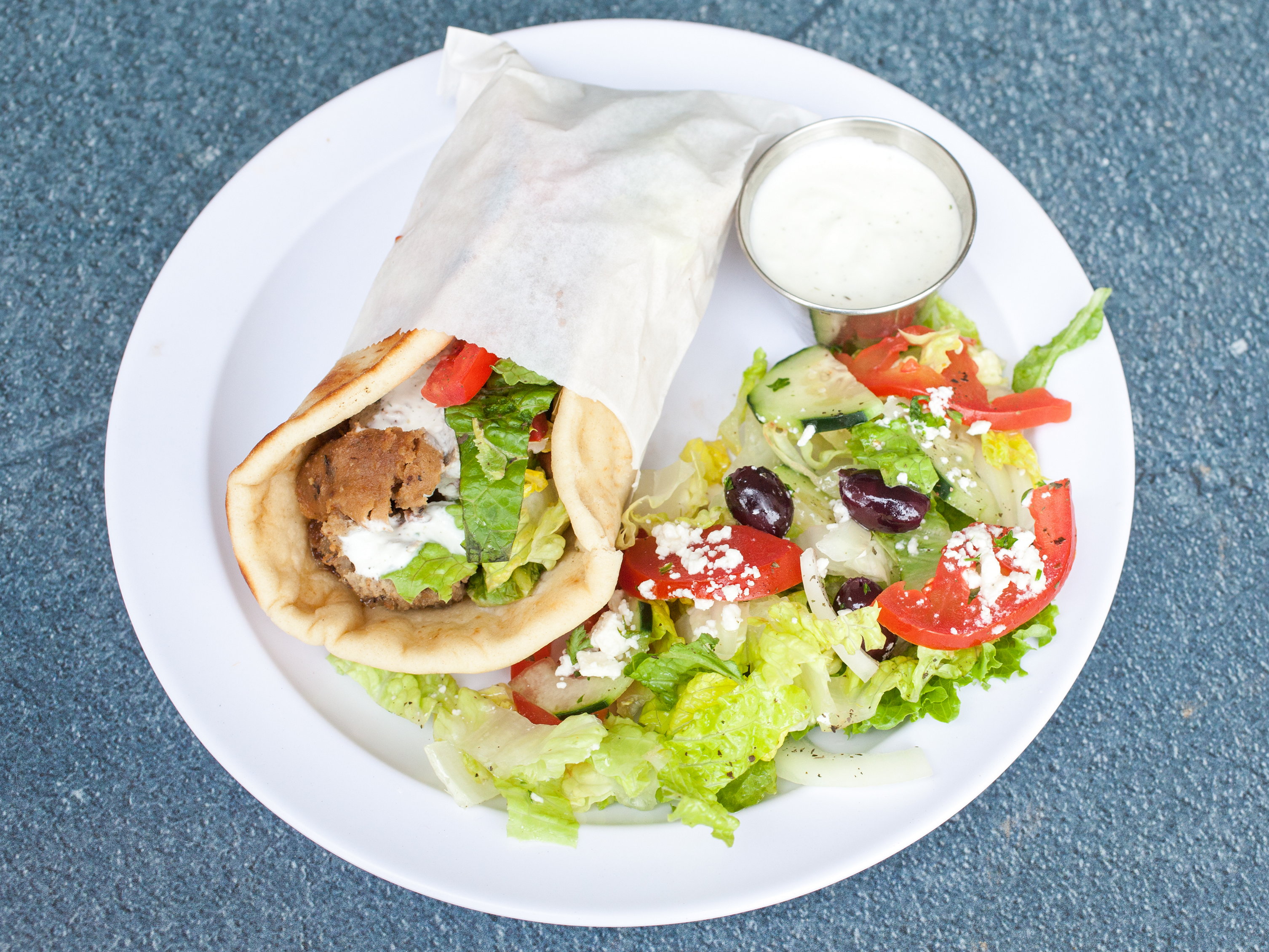 Order Gyro Sandwich Plate food online from Santorini Gyro Greek Food store, Cathedral City on bringmethat.com