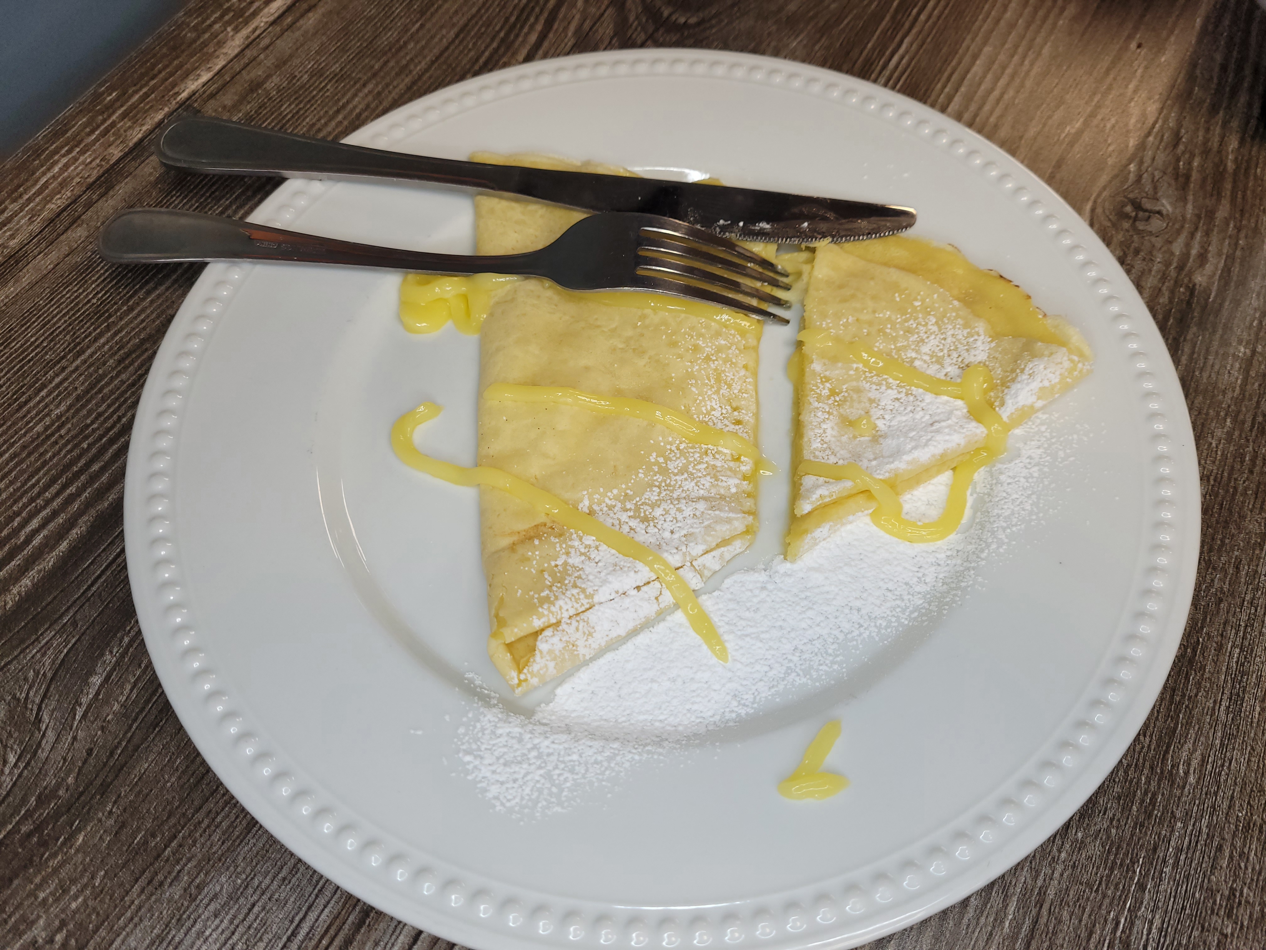 Order Lemon Curd & Powdered Sugar Crepes food online from Lil Mad Cafe Gourmet Shop store, LaSalle on bringmethat.com
