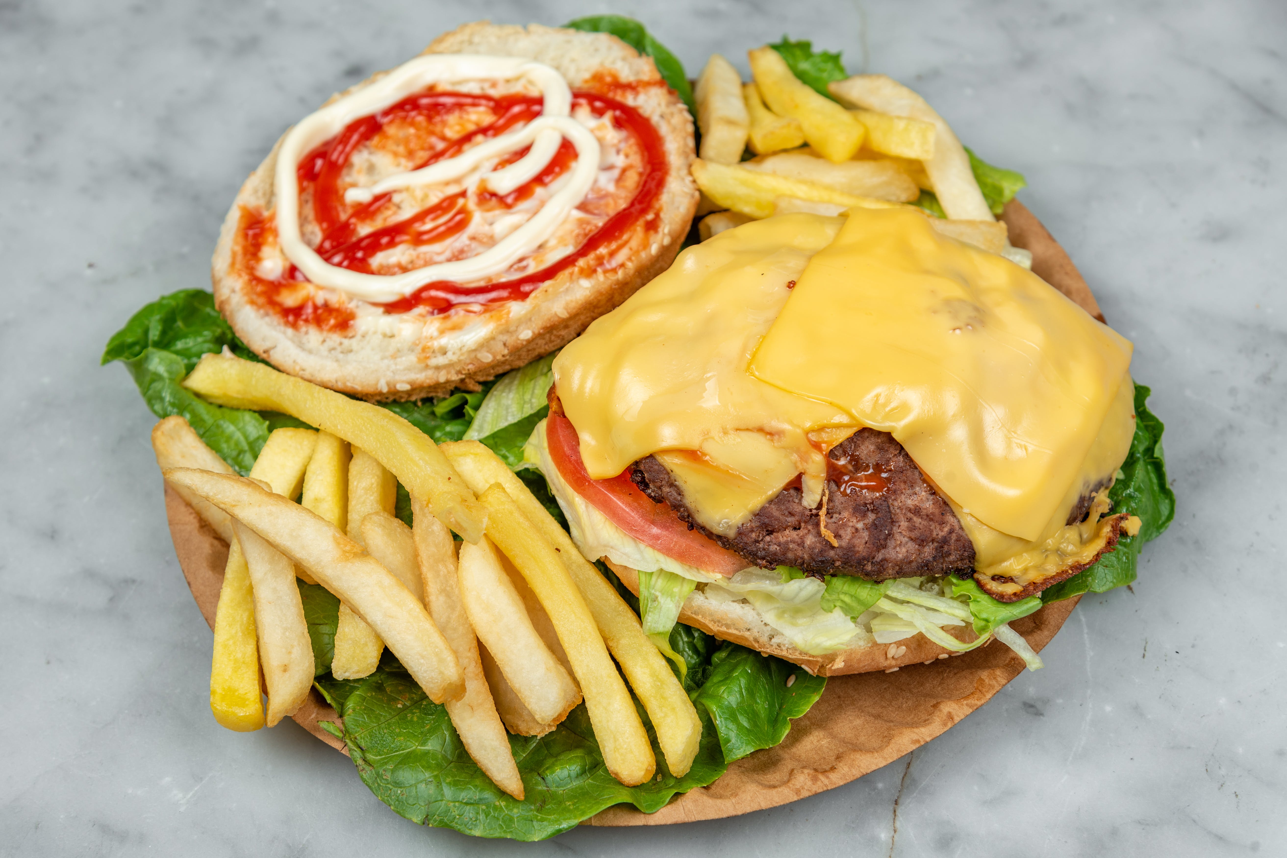 Order Cheeseburger - Burger food online from Rams Pizza Plus store, Bronx on bringmethat.com