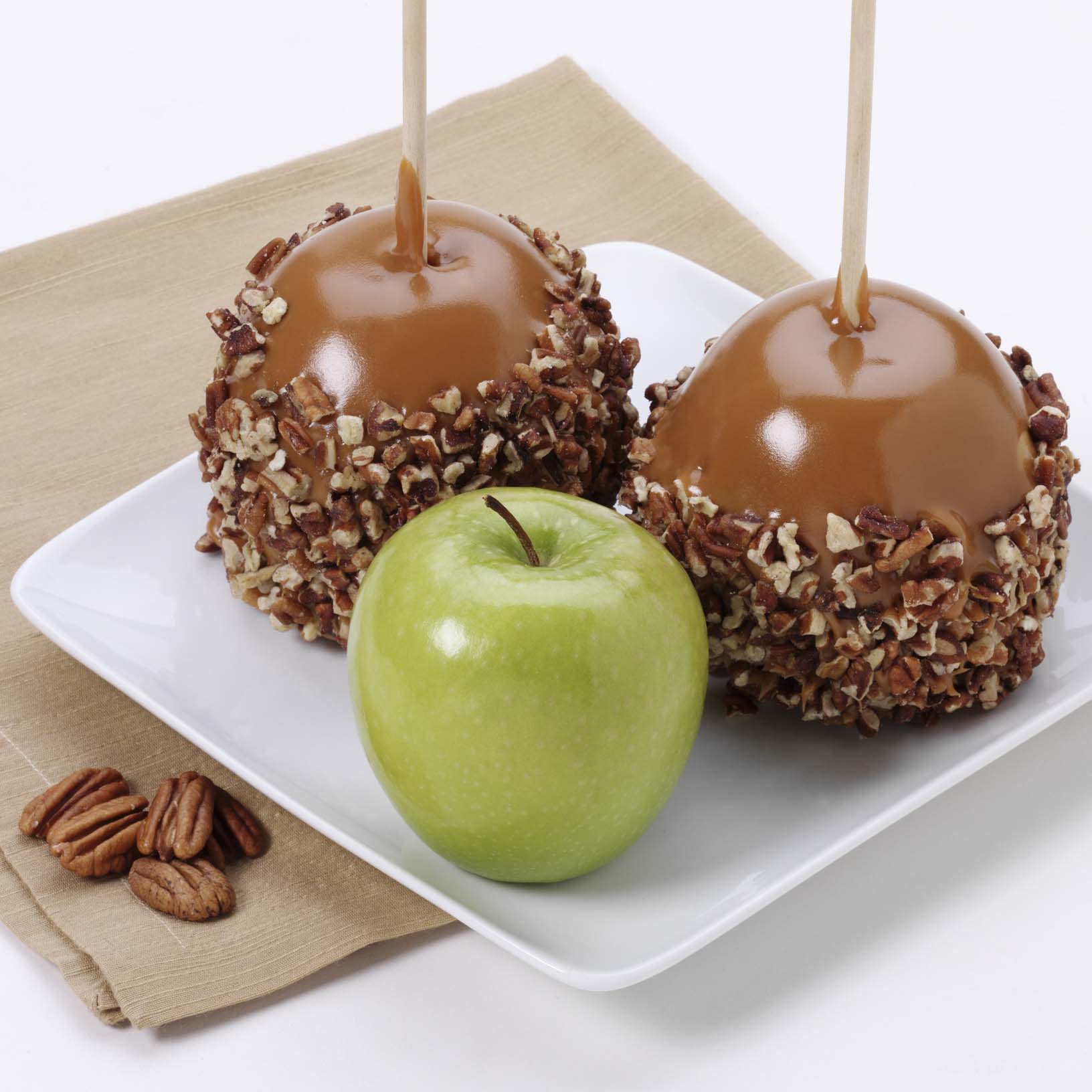 Order Caramel Apple with Pecans food online from Russell Stover Chocolates store, Omaha on bringmethat.com