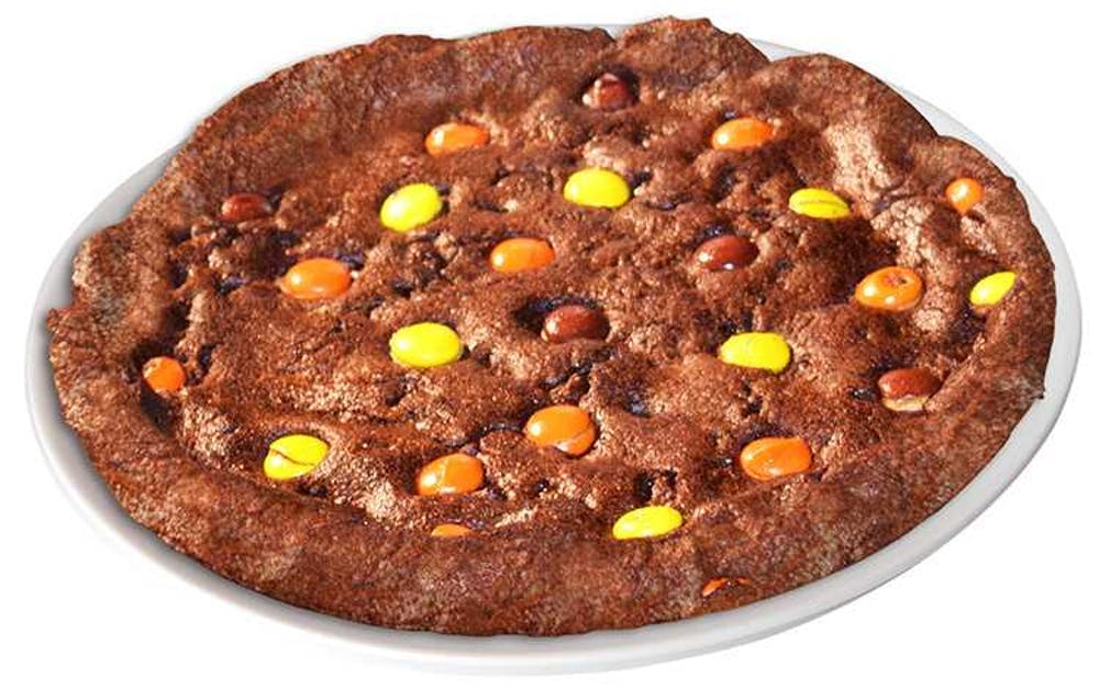 Order Oven Baked Brownie with Reese's Pieces - Dessert food online from Happy's Pizza store, Saginaw on bringmethat.com