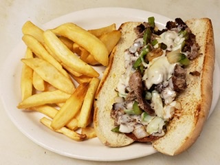 Order Philly Cheese Steak Sandwich with Fries food online from Goldie's Deli and Restaurant store, Strongsville on bringmethat.com