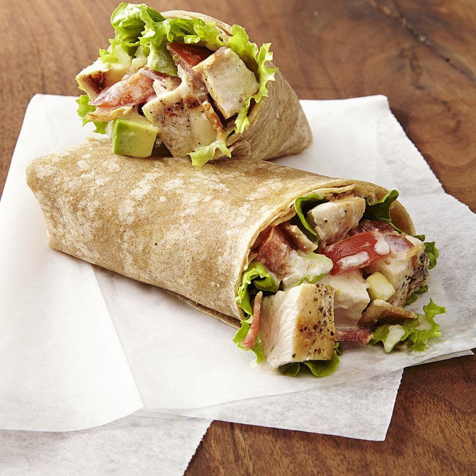 Order Grilled Chicken Caesar Wrap - Wrap food online from Golden Pizzeria store, Norfolk on bringmethat.com