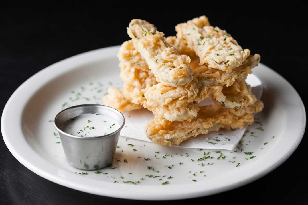 Order Fried Pickles food online from Free Man Cajun Cafe store, Dallas on bringmethat.com