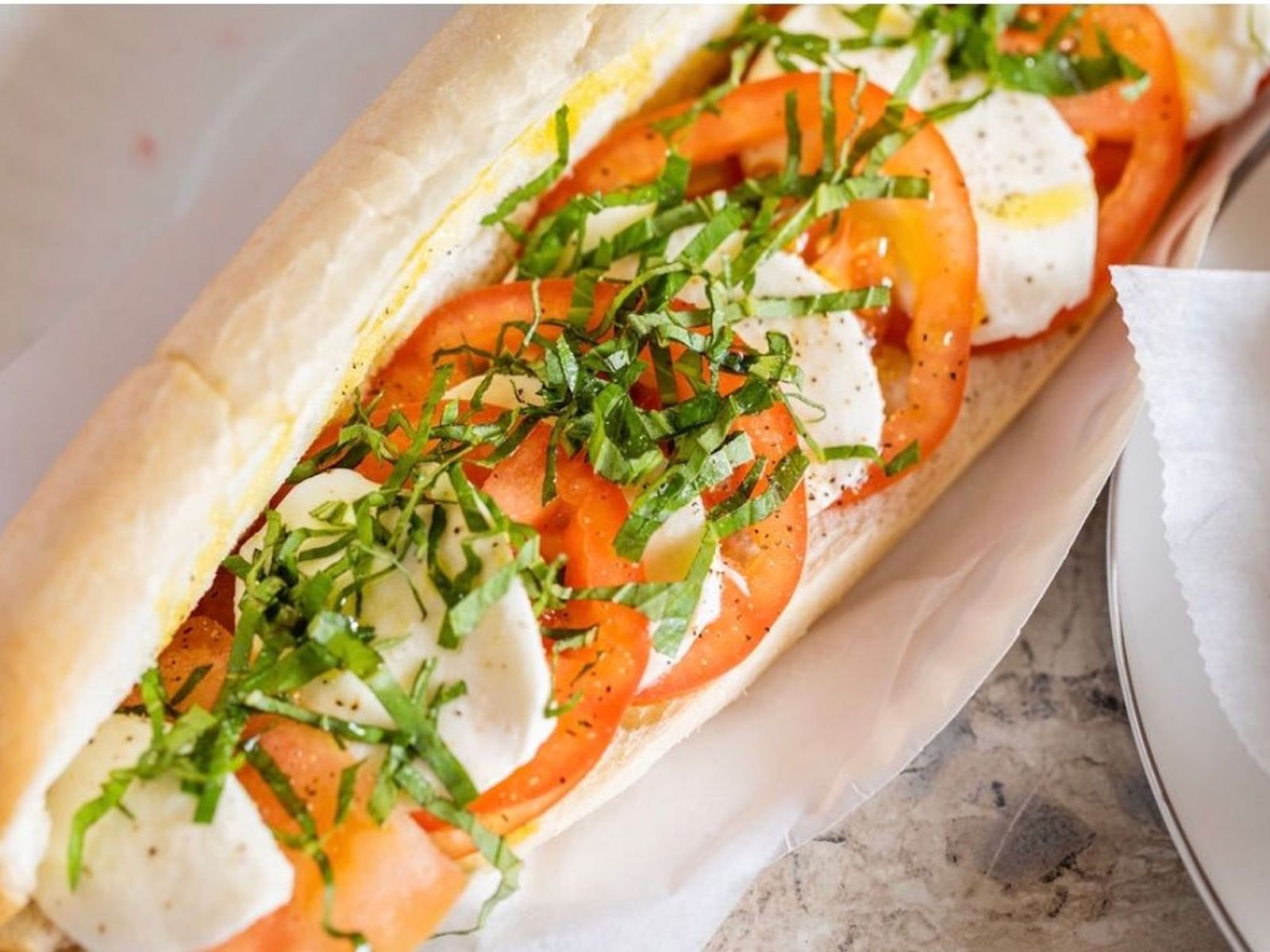 Order Tomato Fresca Sub food online from Lisa's Family Pizzeria store, Wakefield on bringmethat.com
