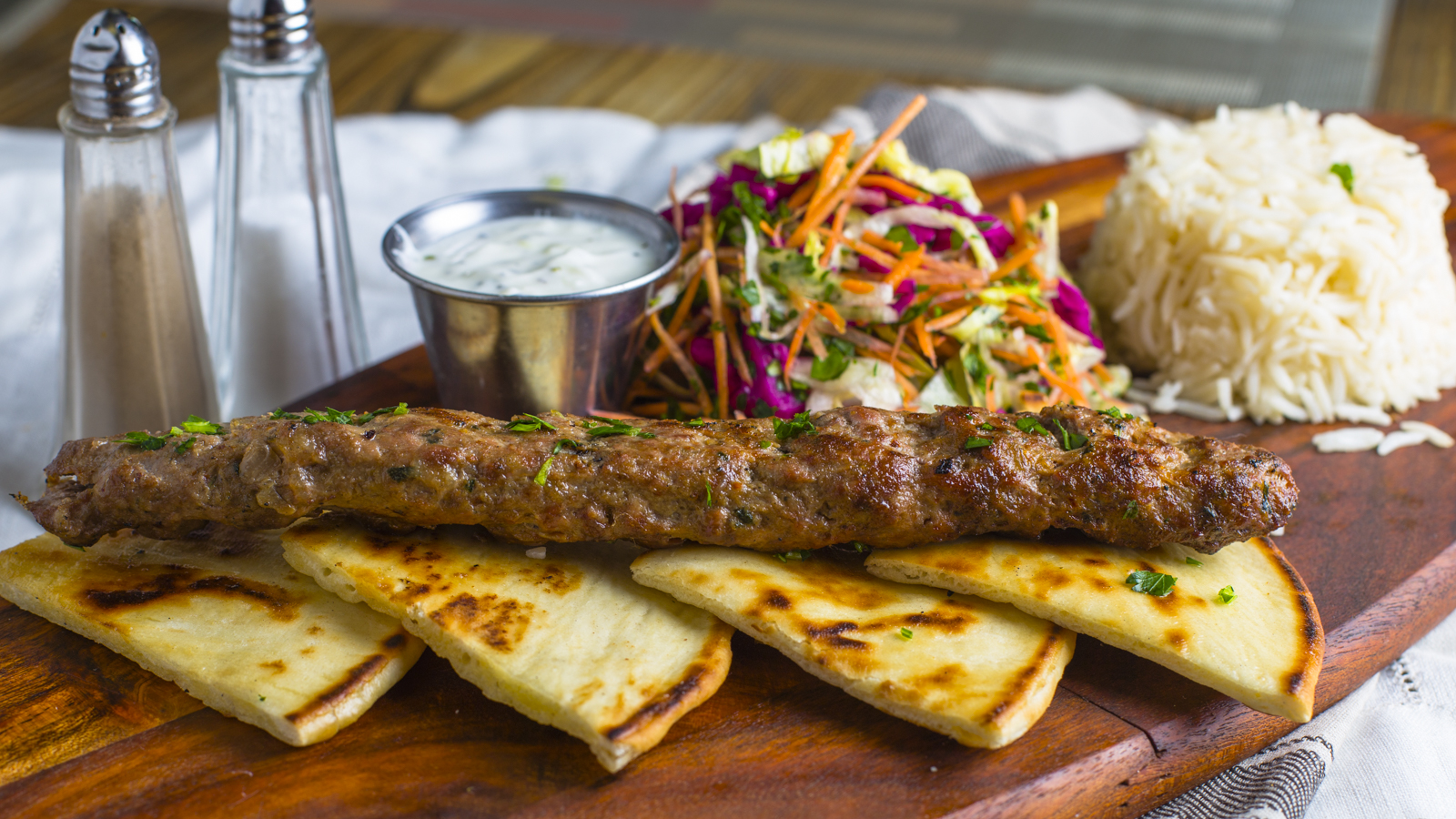Order Adana Kebab food online from Lezzet Cafe store, Dallas on bringmethat.com