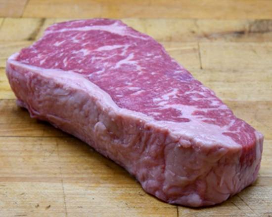 Order 16 oz. Prime Signature Cut New York Strip Butcher's Block food online from Mortons The Steakhouse store, Naperville on bringmethat.com