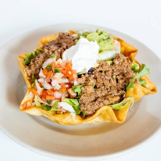 Order Fiesta Taco Salad food online from El Fenix store, Irving on bringmethat.com