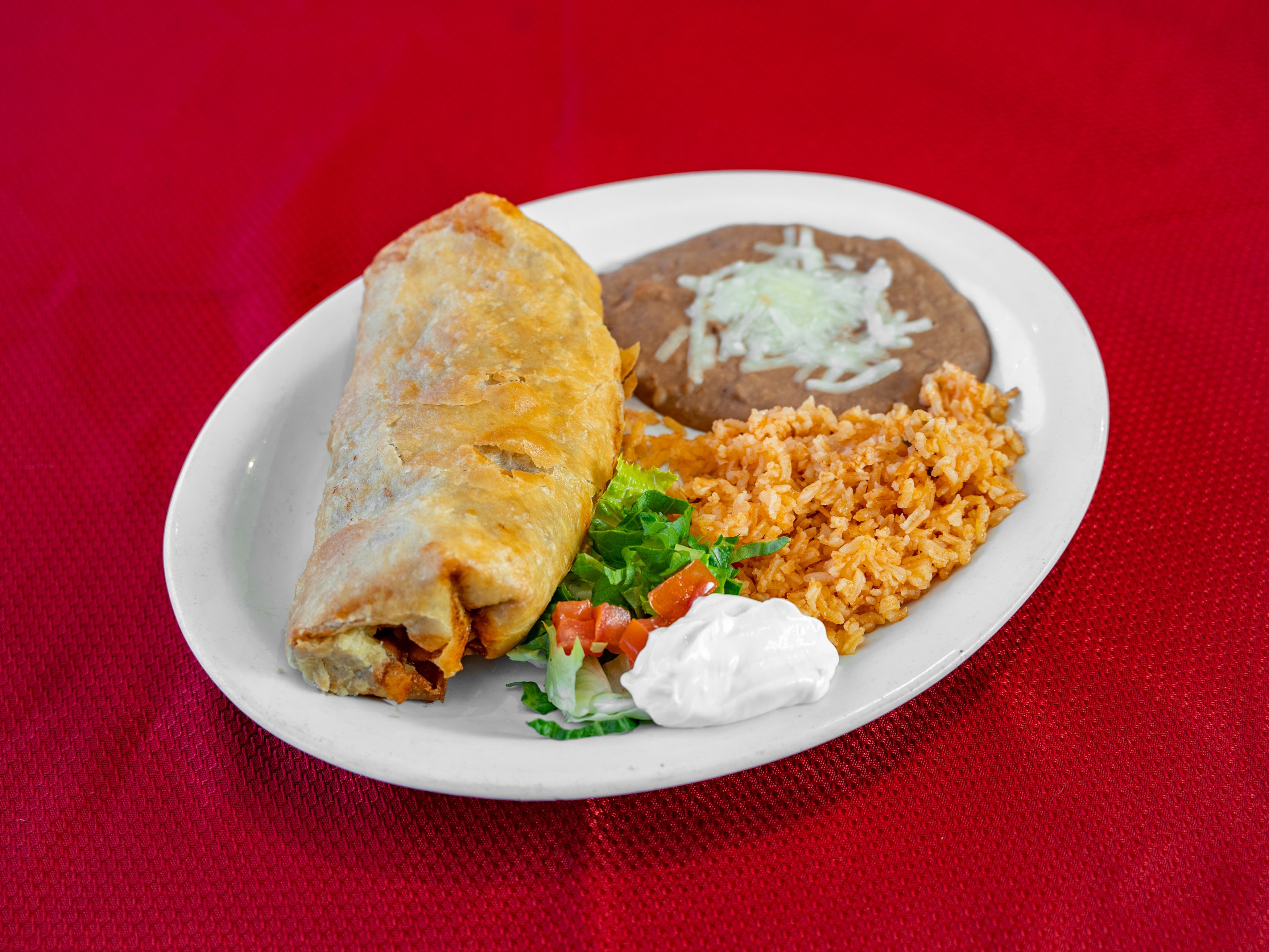 Order Chimichanga Plate food online from Ciscos Taqueria store, Marysville on bringmethat.com