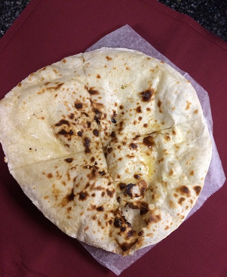 Order Naan food online from Taste Of India Grill store, Bountiful on bringmethat.com