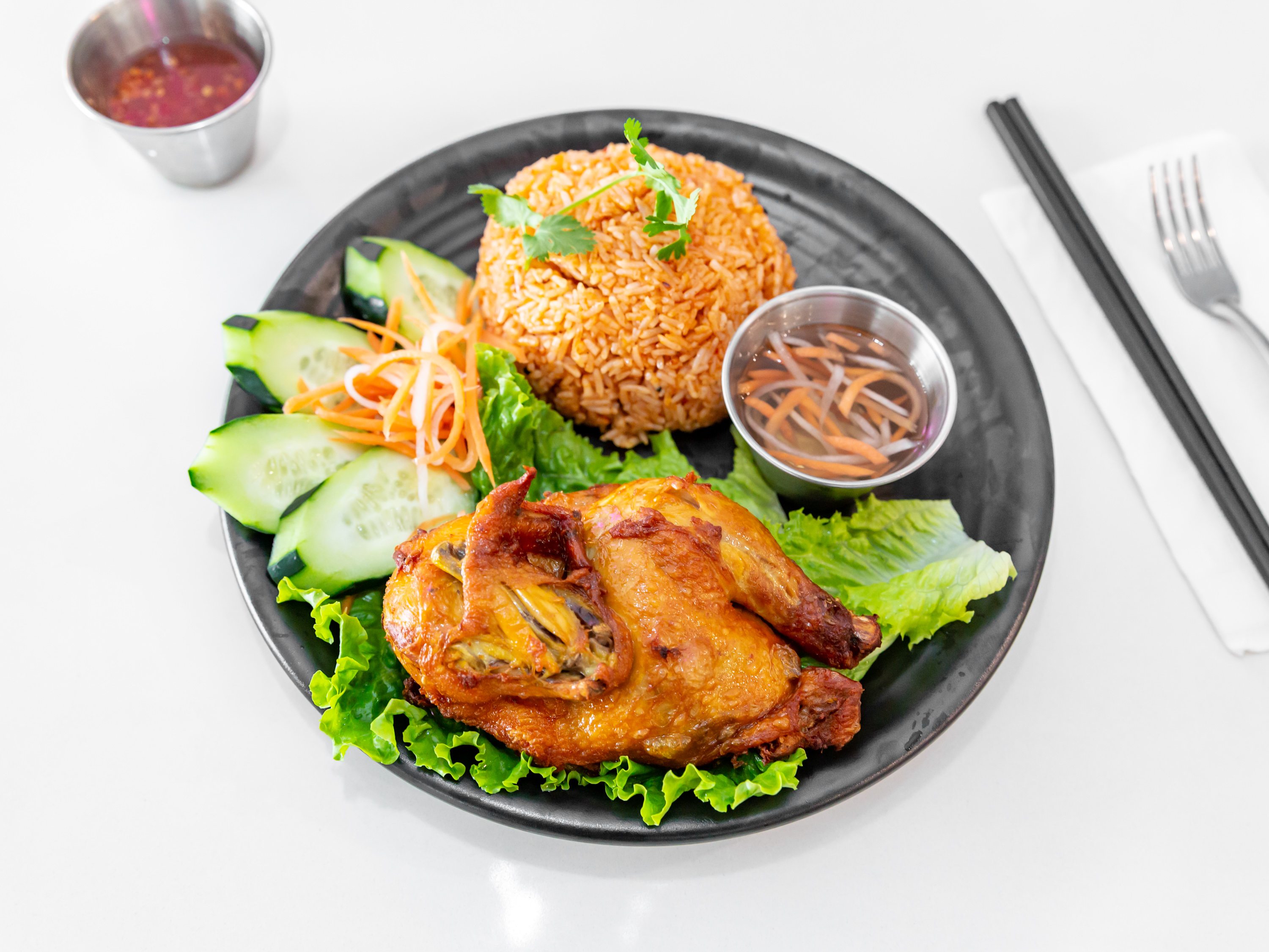 Order Cornish Hen with Red Rice food online from Culantro & Basil Pho Bistro store, West Covina on bringmethat.com