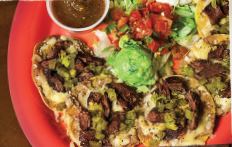 Order Nachos food online from Ojos Locos Sports Cantina store, Houston on bringmethat.com