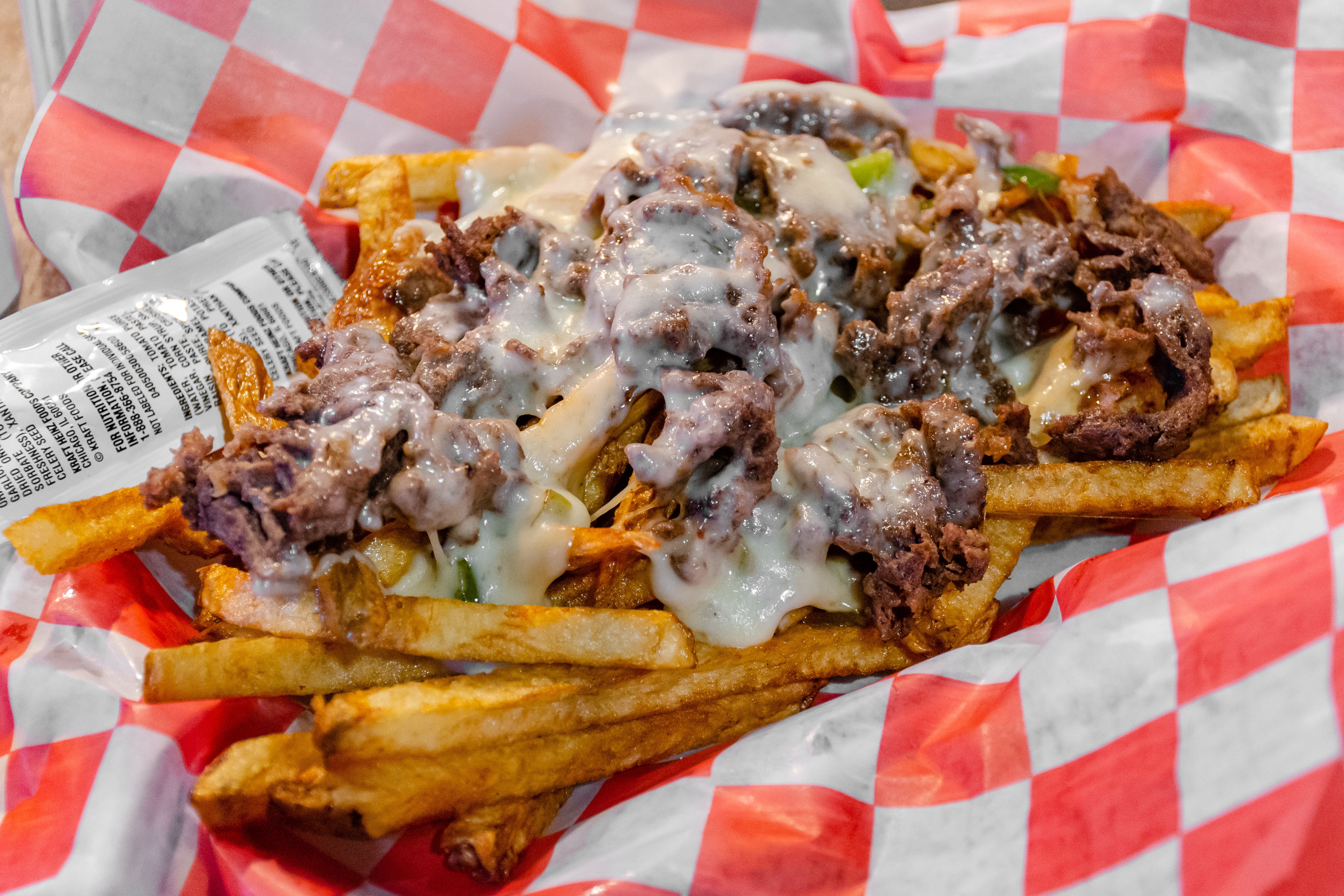 Order Philly Cheese Fries - 1 lb. (Serves 2) food online from Friendly Tavern store, St Marys on bringmethat.com
