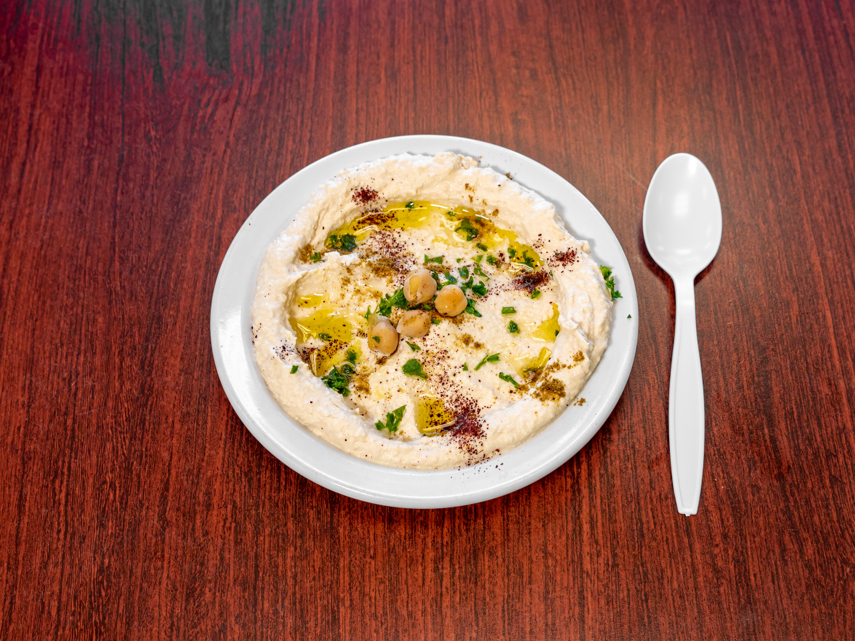 Order Hummus food online from Falafio Mediterranean Cuisine store, Burlingame on bringmethat.com