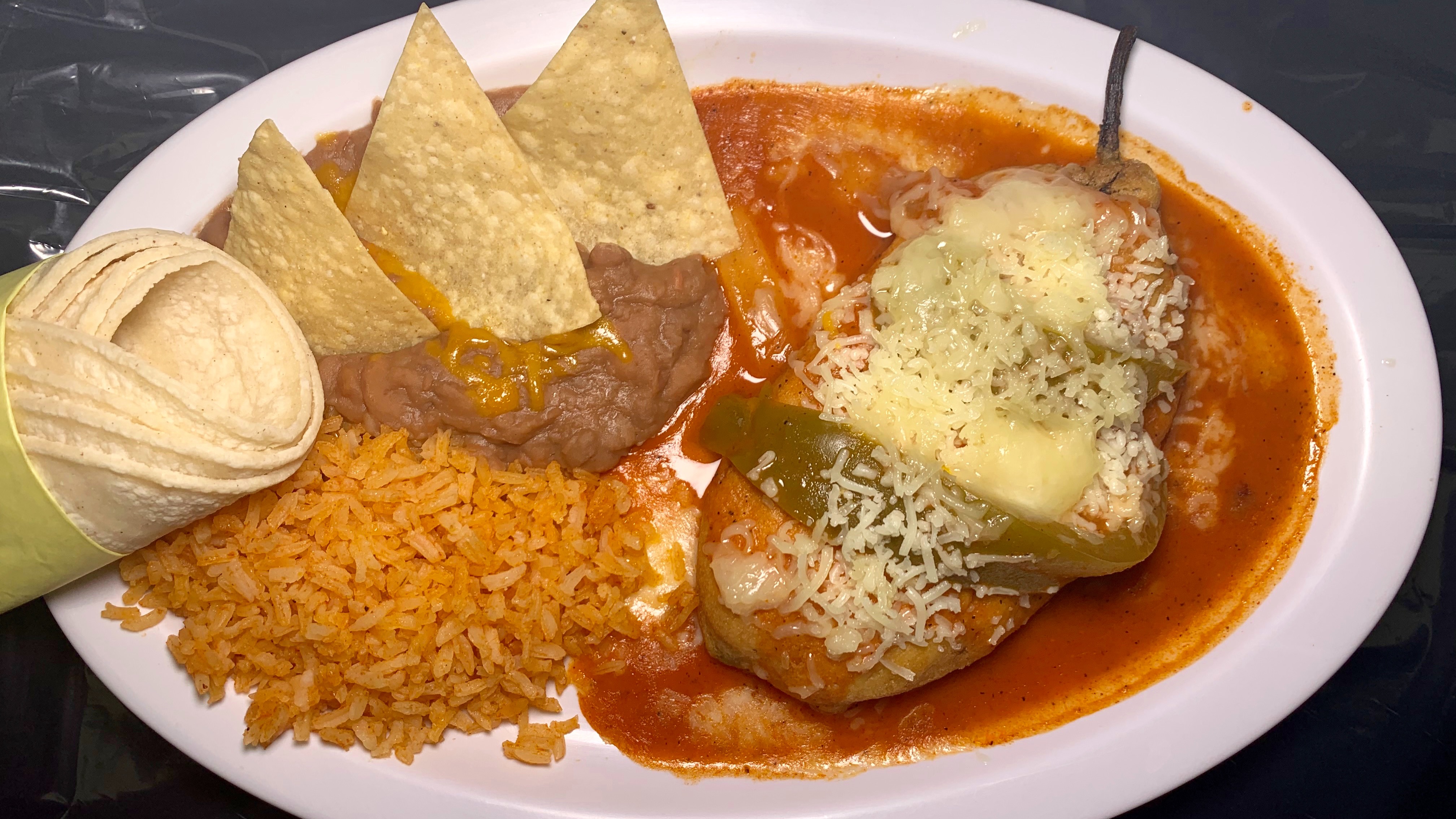 Order 1 Chile Relleno w/ Rice and Beans Plate food online from Durango Taco Shop #4 store, Las Vegas on bringmethat.com