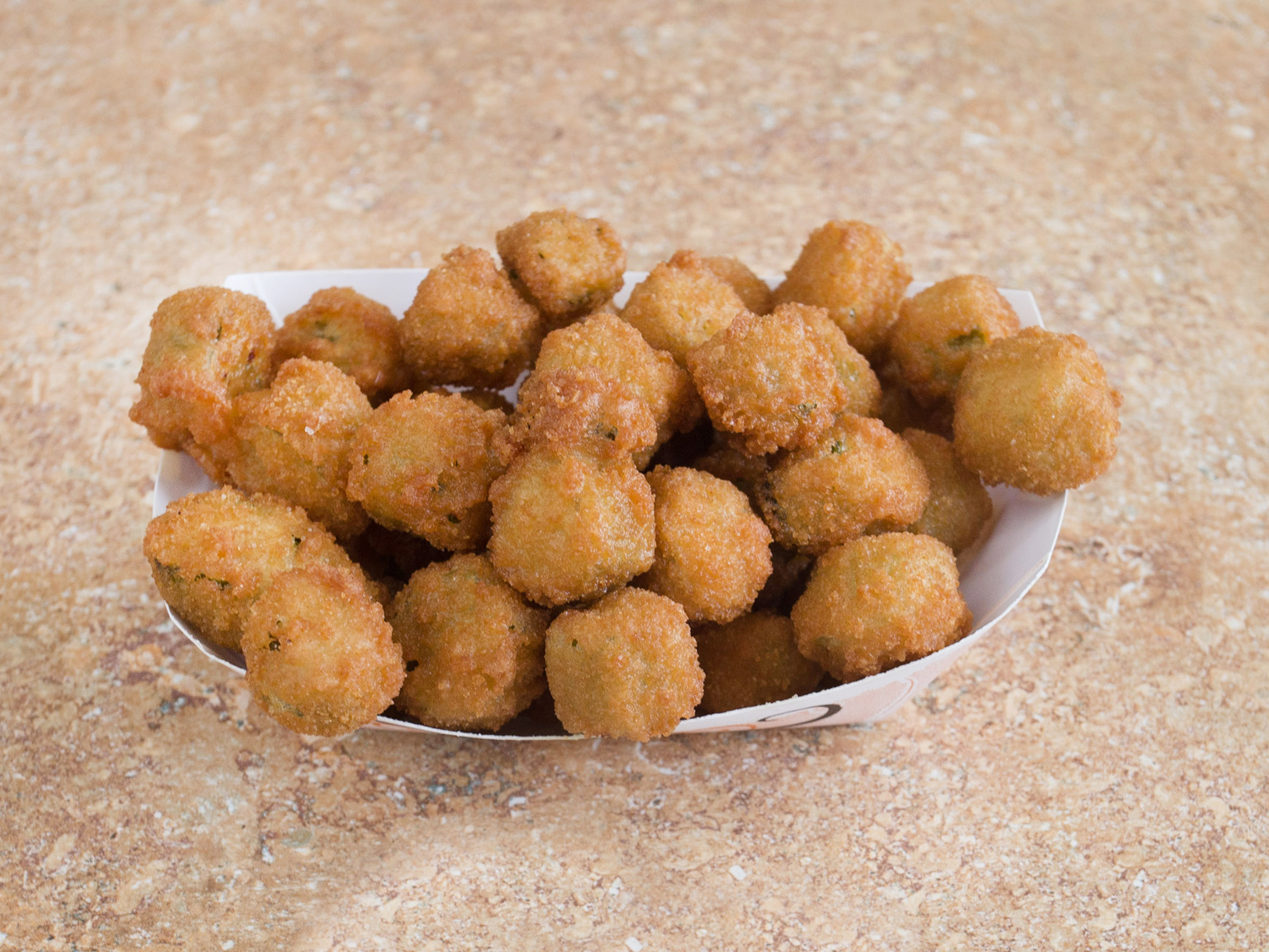 Order Fried Okra food online from Chicken Express store, Austin on bringmethat.com
