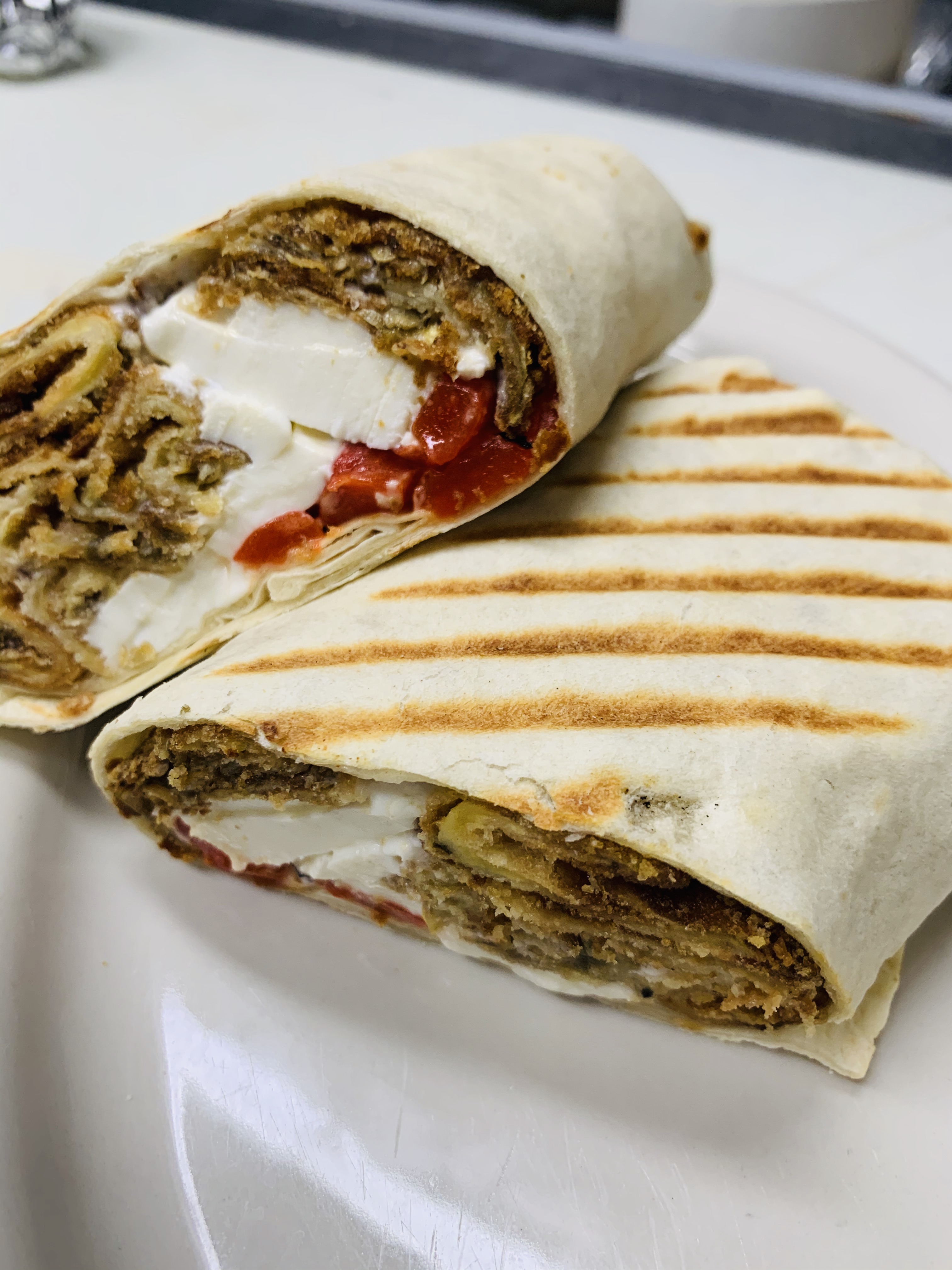 Order Eggplant, Fresh Mozzarella and Roasted Peppers Wrap food online from Westbrook Pizzeria store, Cortlandt Manor on bringmethat.com