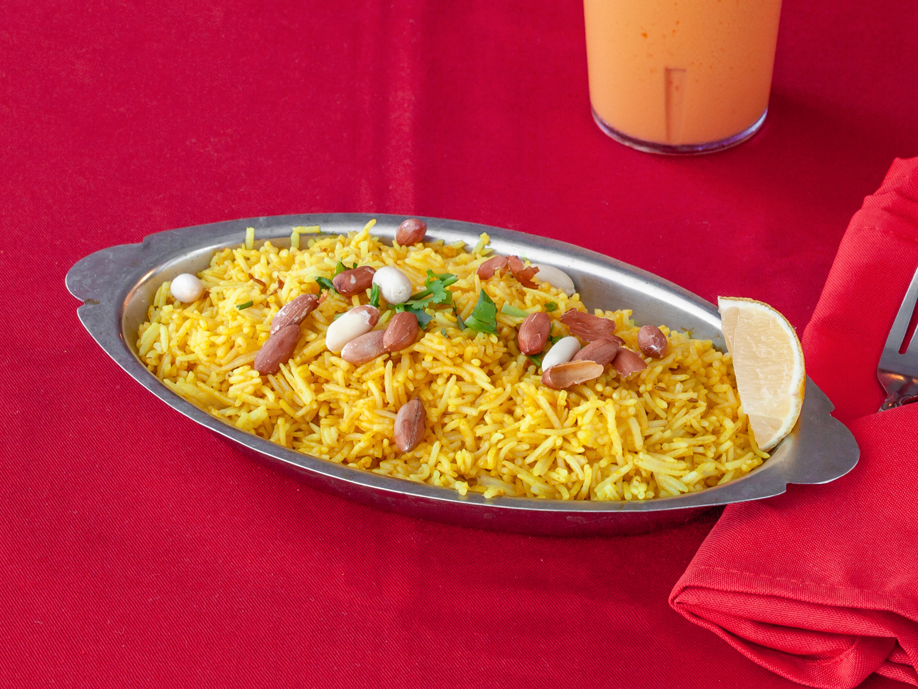 Order 35. Lemon Rice food online from Ambar Indian Restaurant store, Champaign on bringmethat.com