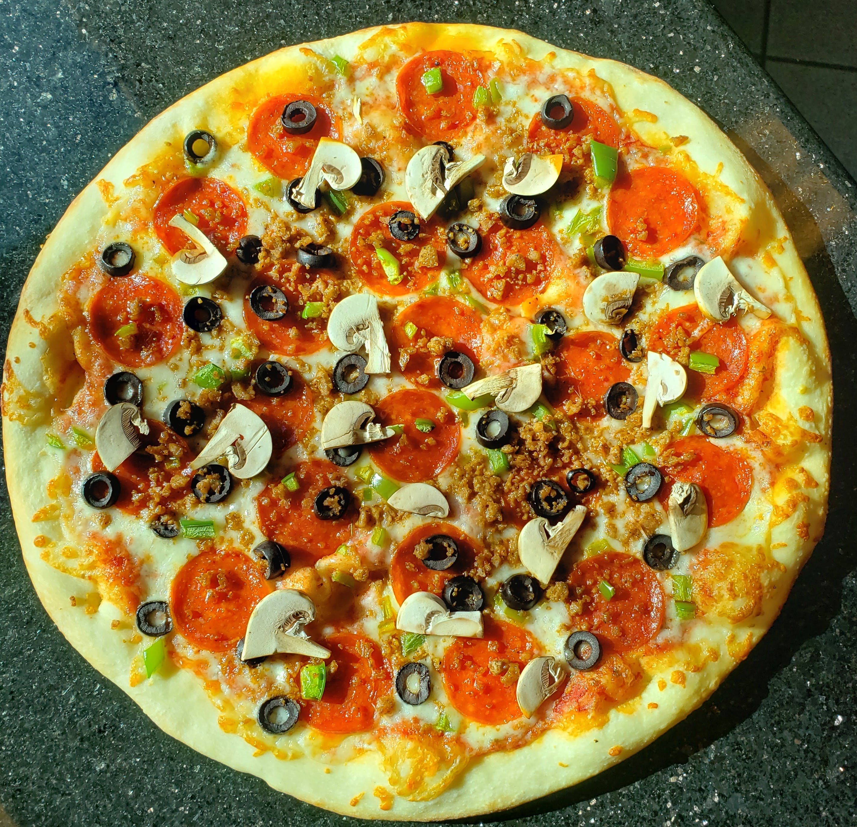 Order Greco's Special Pizza - Medium 12" food online from Grecos New York Pizzeria store, Thousand Oaks on bringmethat.com