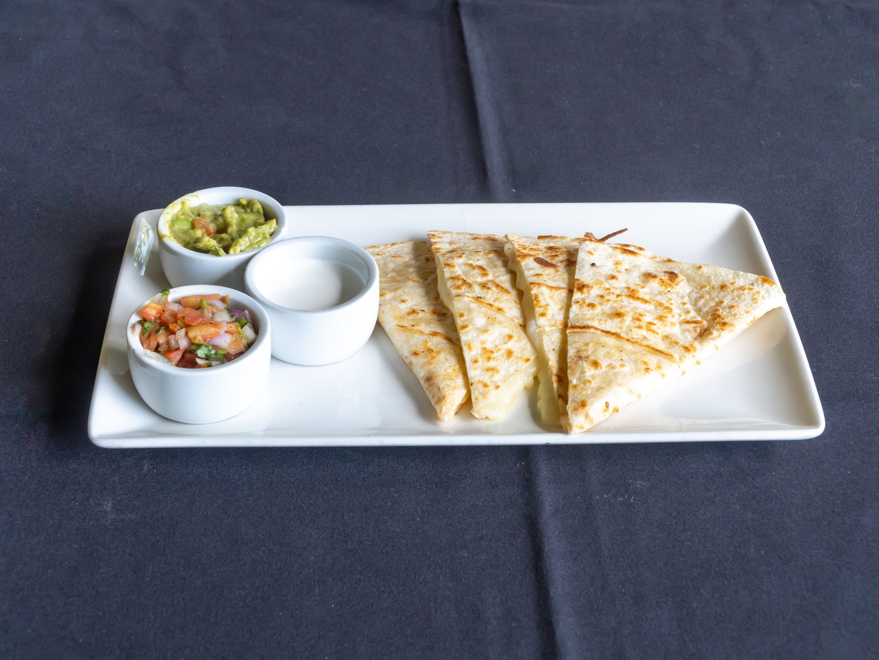 Order Quesadilla Shareable food online from Red Restaurant & Bar store, City of Industry on bringmethat.com