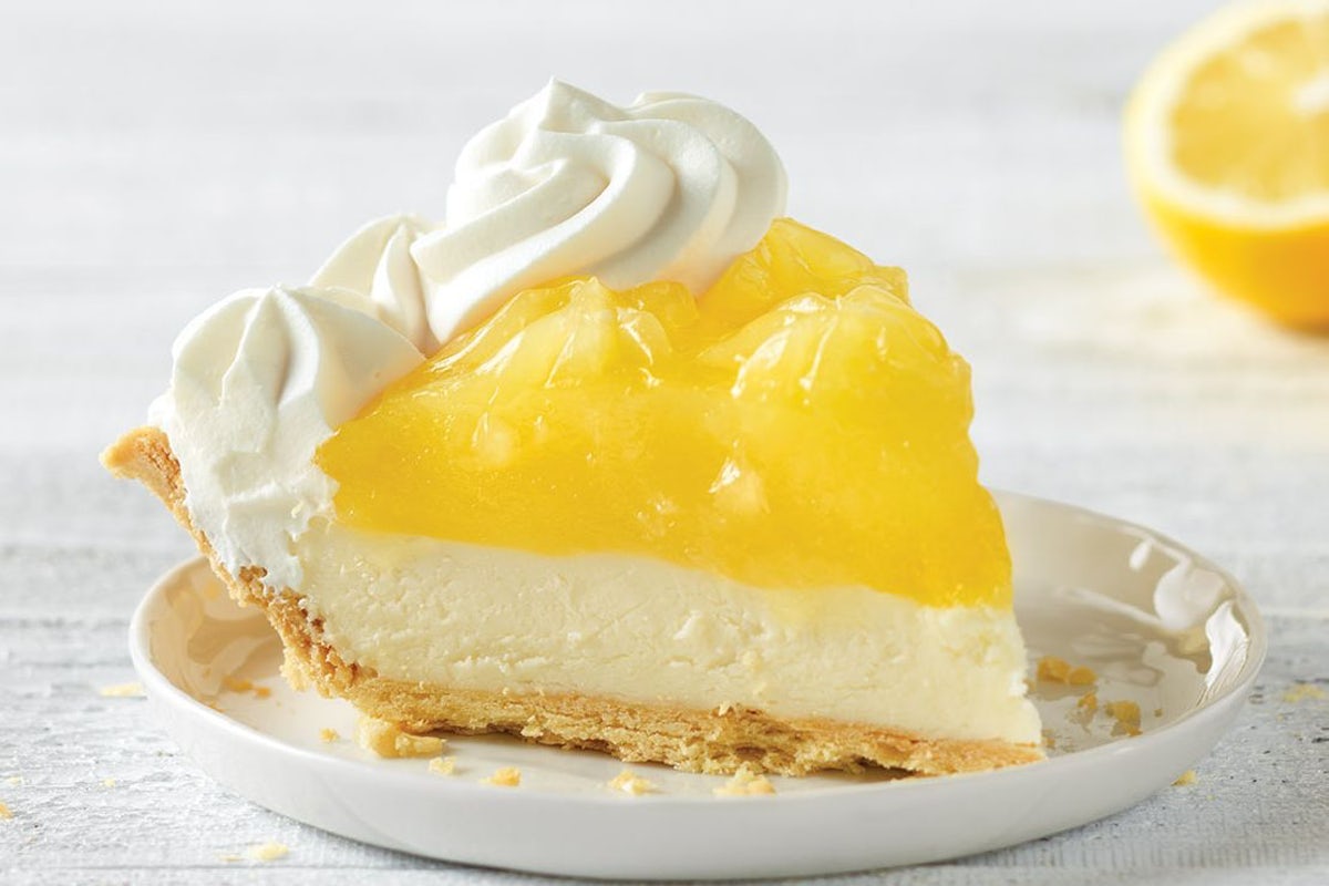 Order Lemon Supreme Pie Slice food online from Village Inn store, Goodyear on bringmethat.com